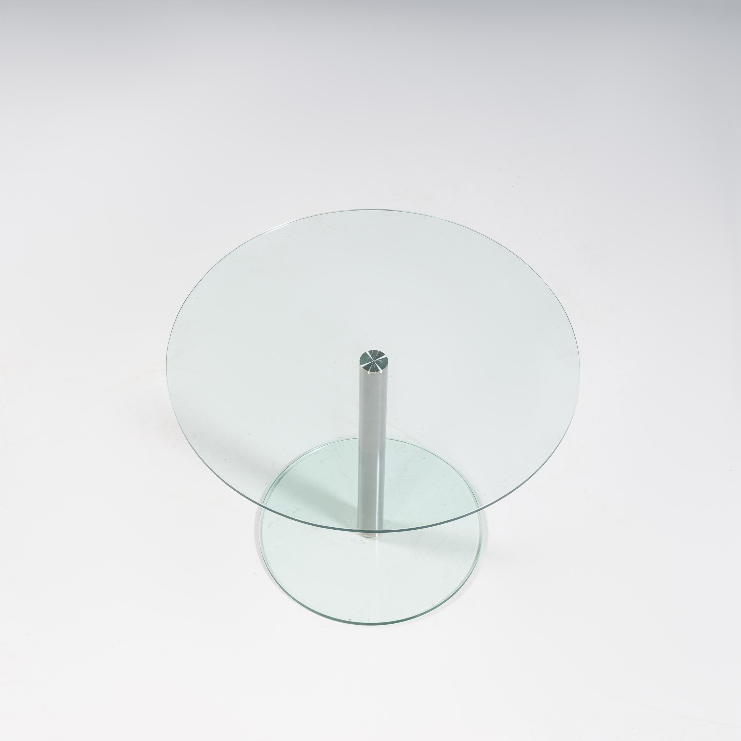 The Circle 100 table is a sleek and sophisticated glass pedestal dining table from The Conran Shop.

Featuring a round toughened glass top and base, the pedestal base has an epoxy-coated steel support and can seat up to four.

The glass gives