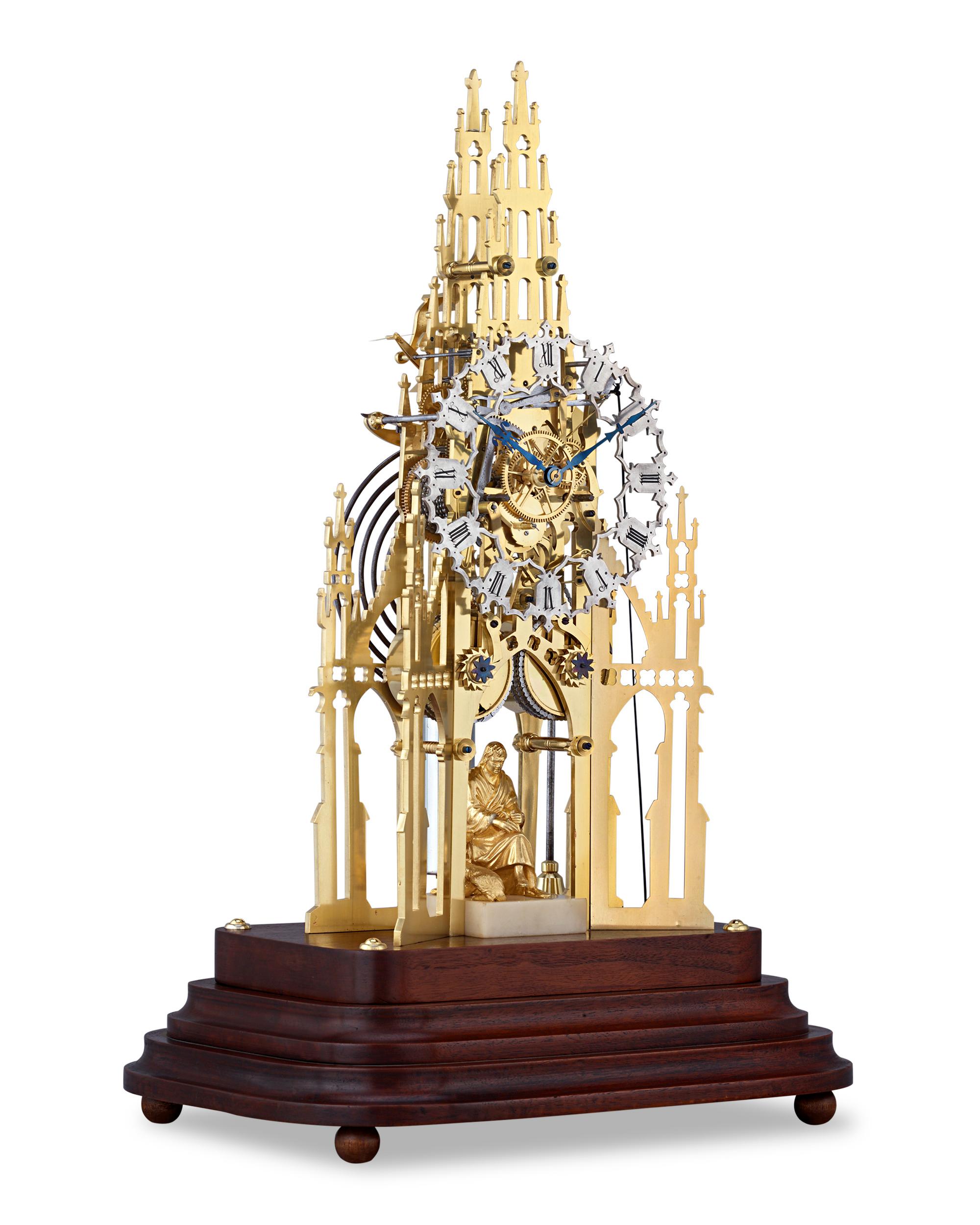 Skillfully designed in homage to the grand Sir Walter Scott Memorial in Edinburgh, Scotland, this Victorian brass skeleton clock is a wonderful specimen of English clockmaking. The clock keeps the time with a highly accurate eight-day two-train