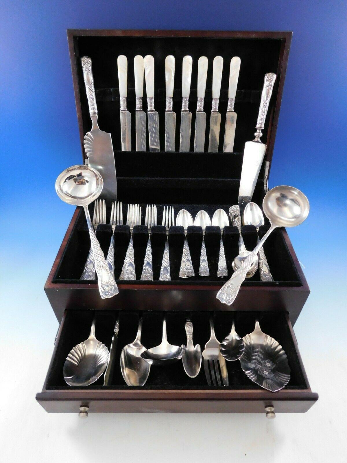 Outstanding siren by International/Rogers Bros, circa 1891, silver plated flatware set, 44 pieces plus 8 mother of pearl handle knives. This figural pattern features a woman with flowing hair. In Greek mythology, Sirens were mermaid creatures who