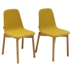 Siren chairs with solid oak base, fabric in yellow, by Jacob Nitz for Bogaerts
