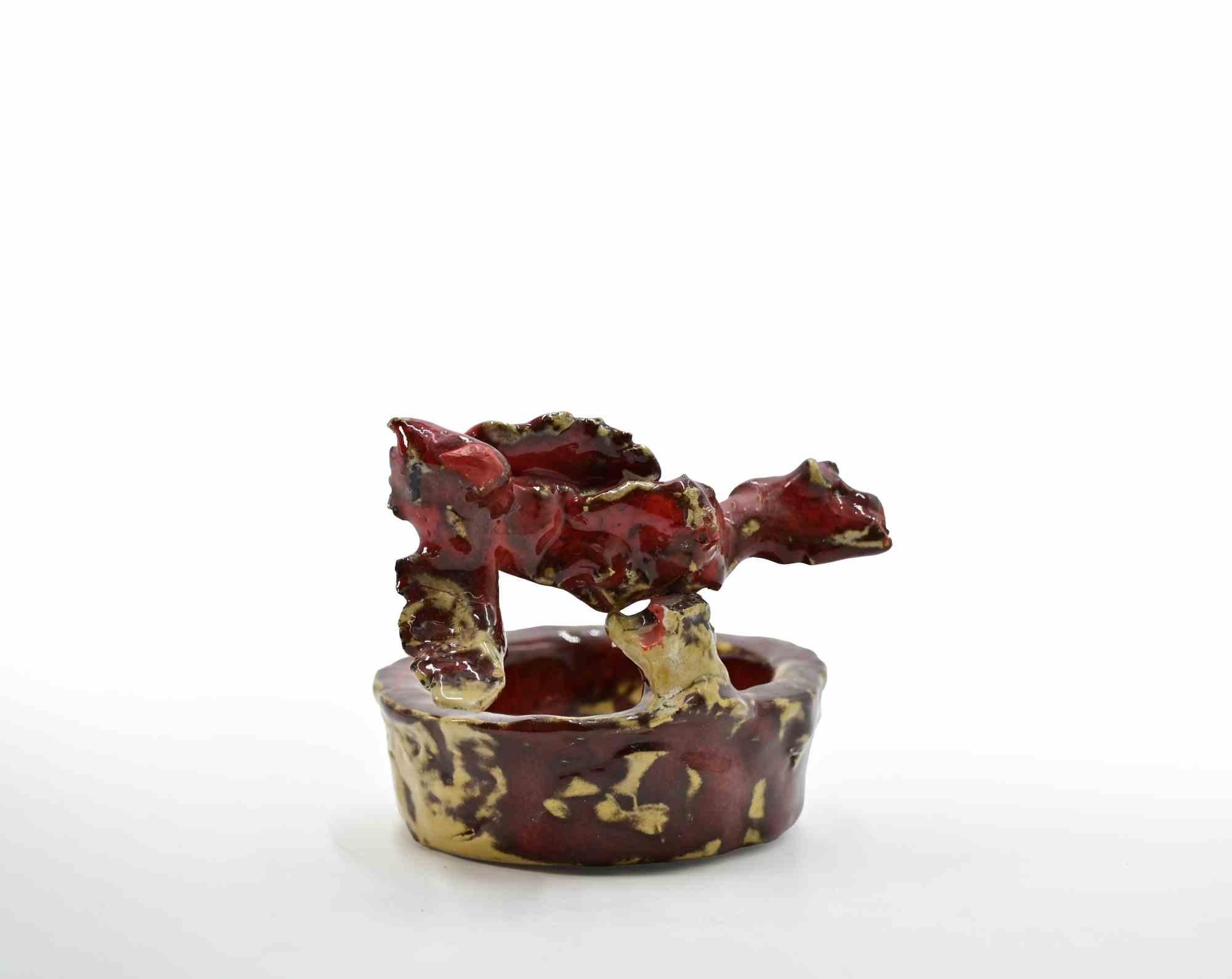 Painted glazed terracotta sculpture by Sirio Pellegrini, realized in 1960s.

Good condition.

Sirio Pellegrini, born in Rome on March 1, 1922, of Abruzzo origins (Capestrano), spent his childhood years in Rome, in the heart of the old city, behind