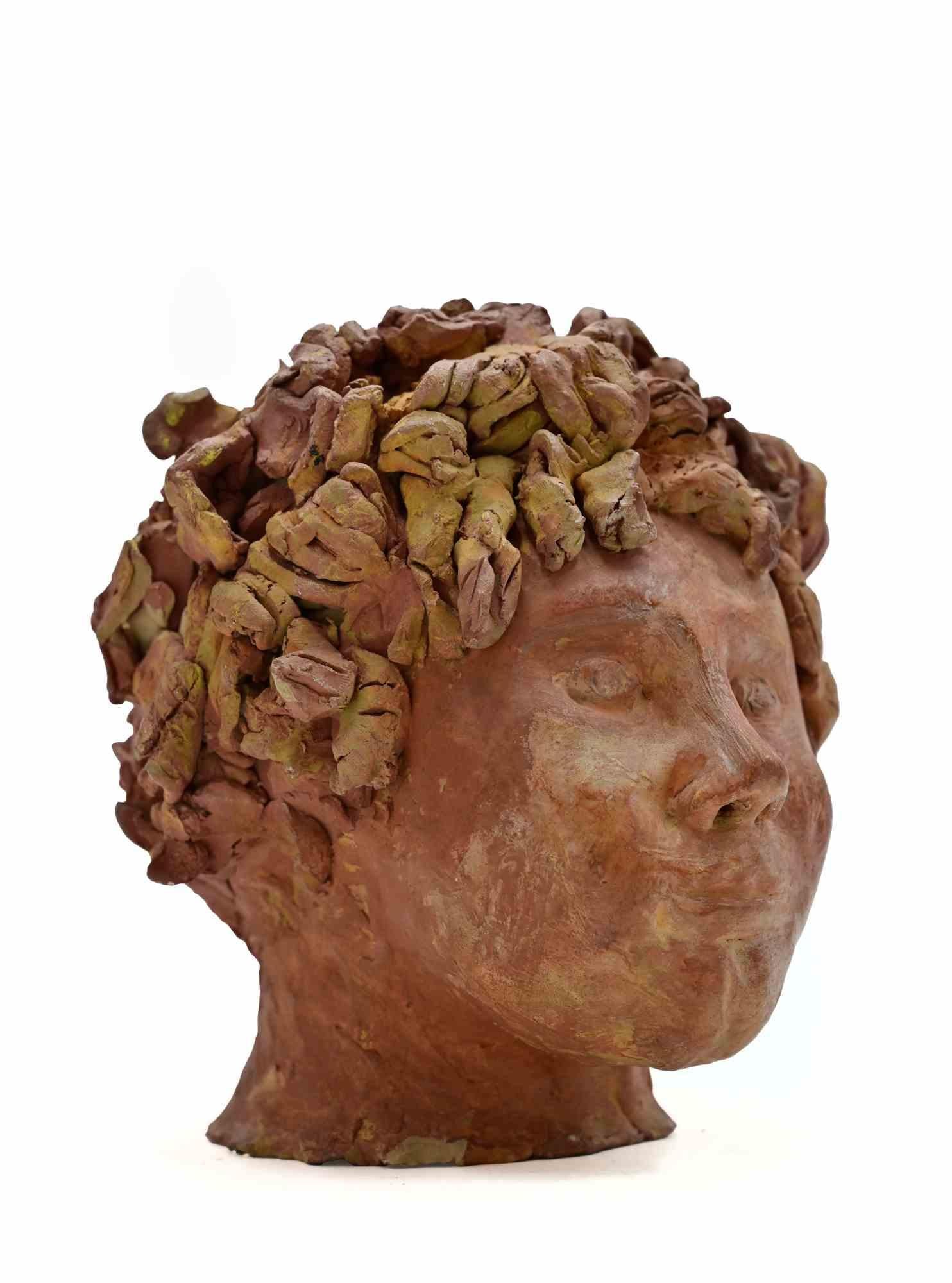 Painted Terracotta sculture realized by Sirio Pellegrini in 1960s.

Good condition.

Sirio Pellegrini, born in Rome on March 1, 1922, of Abruzzo origins (Capestrano), spent his childhood years in Rome, in the heart of the old city, behind the