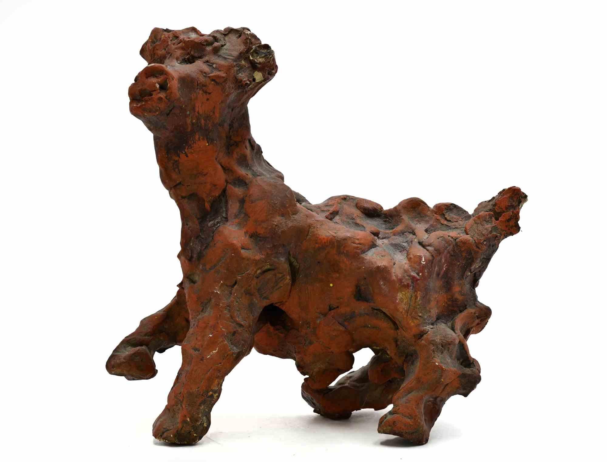 Sculpture en terre cuite peinte réalisée par Sirio Pellegrini dans les années 1960.

Bon état.

Sirio Pellegrini, né à Rome le 1er mars 1922, d'origine abruzzaise (Capestrano), a passé ses années d'enfance à Rome, au cœur de la vieille ville,