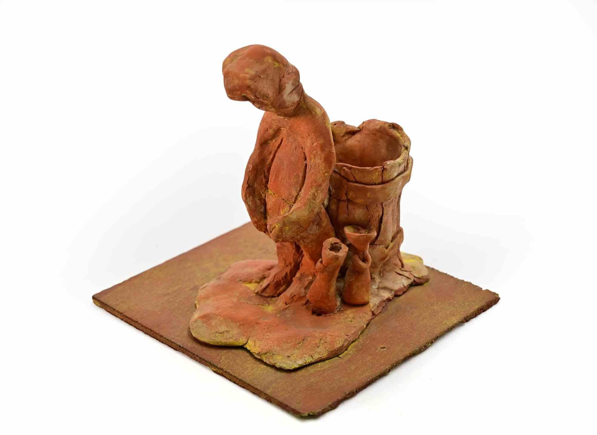 Sculpture en terre cuite peinte réalisée par Sirio Pellegrini dans les années 1960.

Bon état.

Sirio Pellegrini, né à Rome le 1er mars 1922, d'origine abruzzaise (Capestrano), a passé ses années d'enfance à Rome, au cœur de la vieille ville,