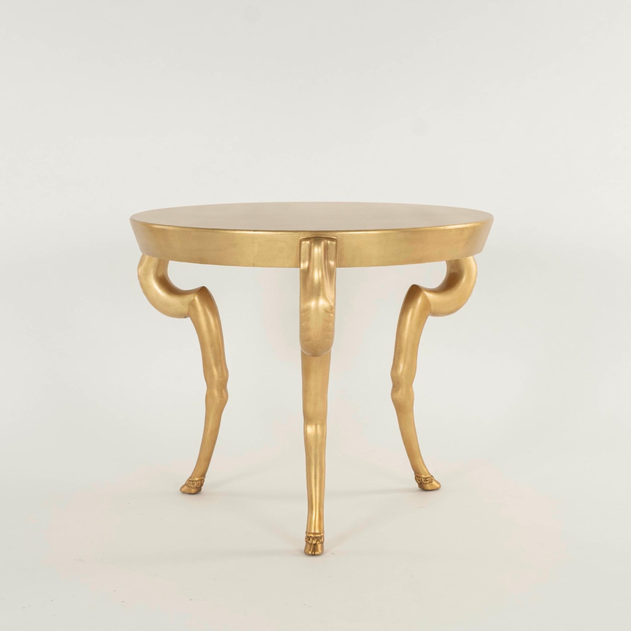 A rare and iconic hand carved gilt leaf goat leg table by Sirmos.

Sirmos. The word comes from Greek meaning “ to mold” “to shape” “to style”. Throughout the years, Sirmos has created exclusive collections of distinctive furnishings available only