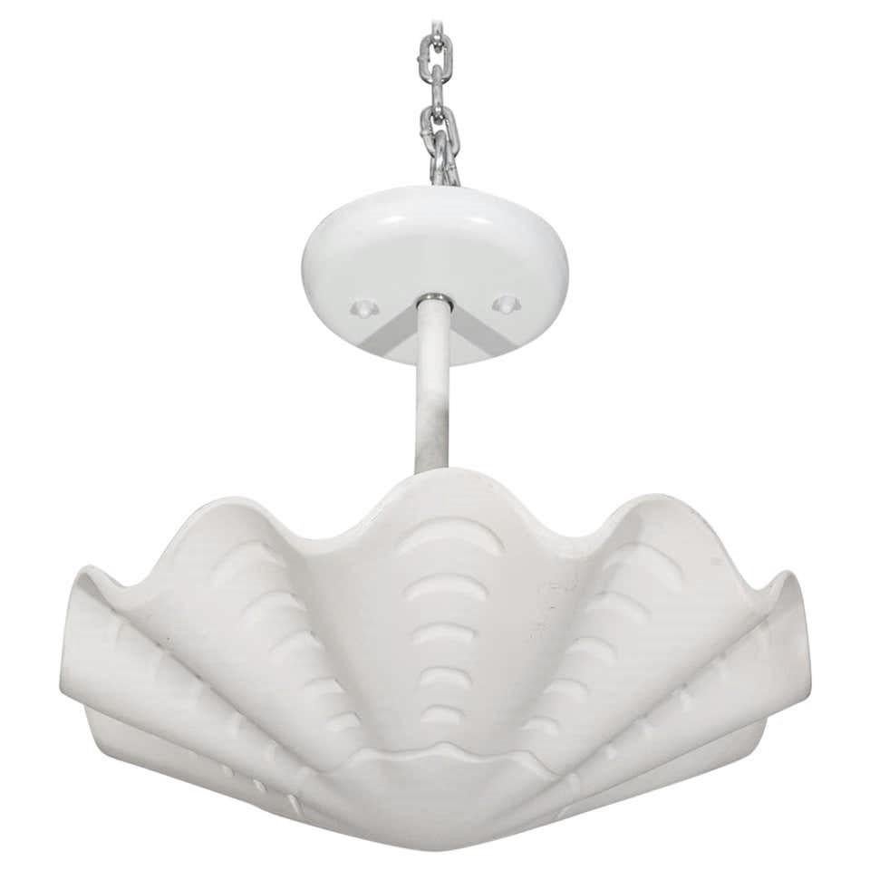 This stylish and chic petit shell-form chandleir dates to the 1970s and was created by Sirmos. and the piece was called the 
