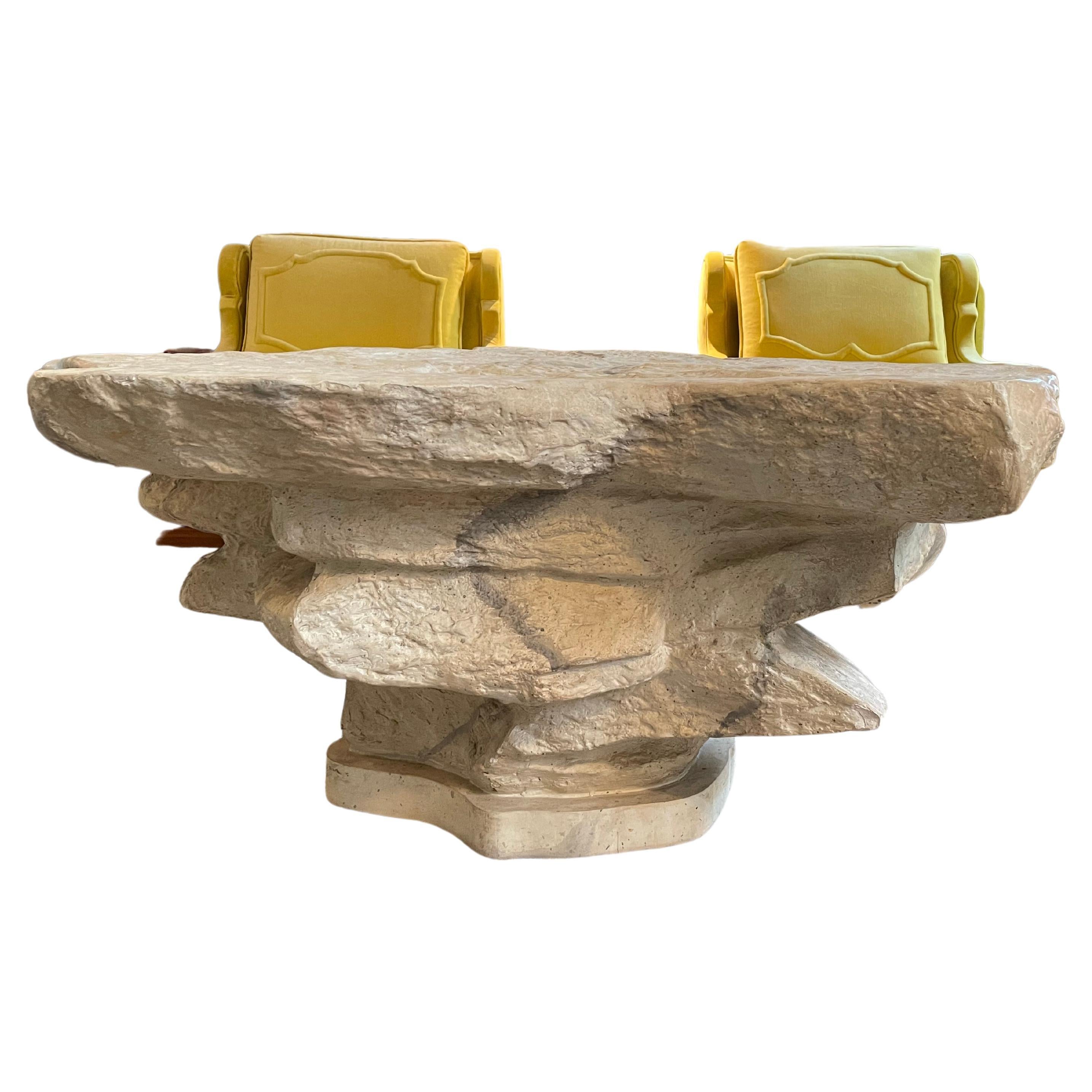 Highly Sought After - stunning stacked stone plaster coffee or drinks table in the manner of Emilio Terry. Lovely veining throughout this irregular shaped piece. Capturing Nature’s Beauty for function and design. From an estate in Sanford, Ct that