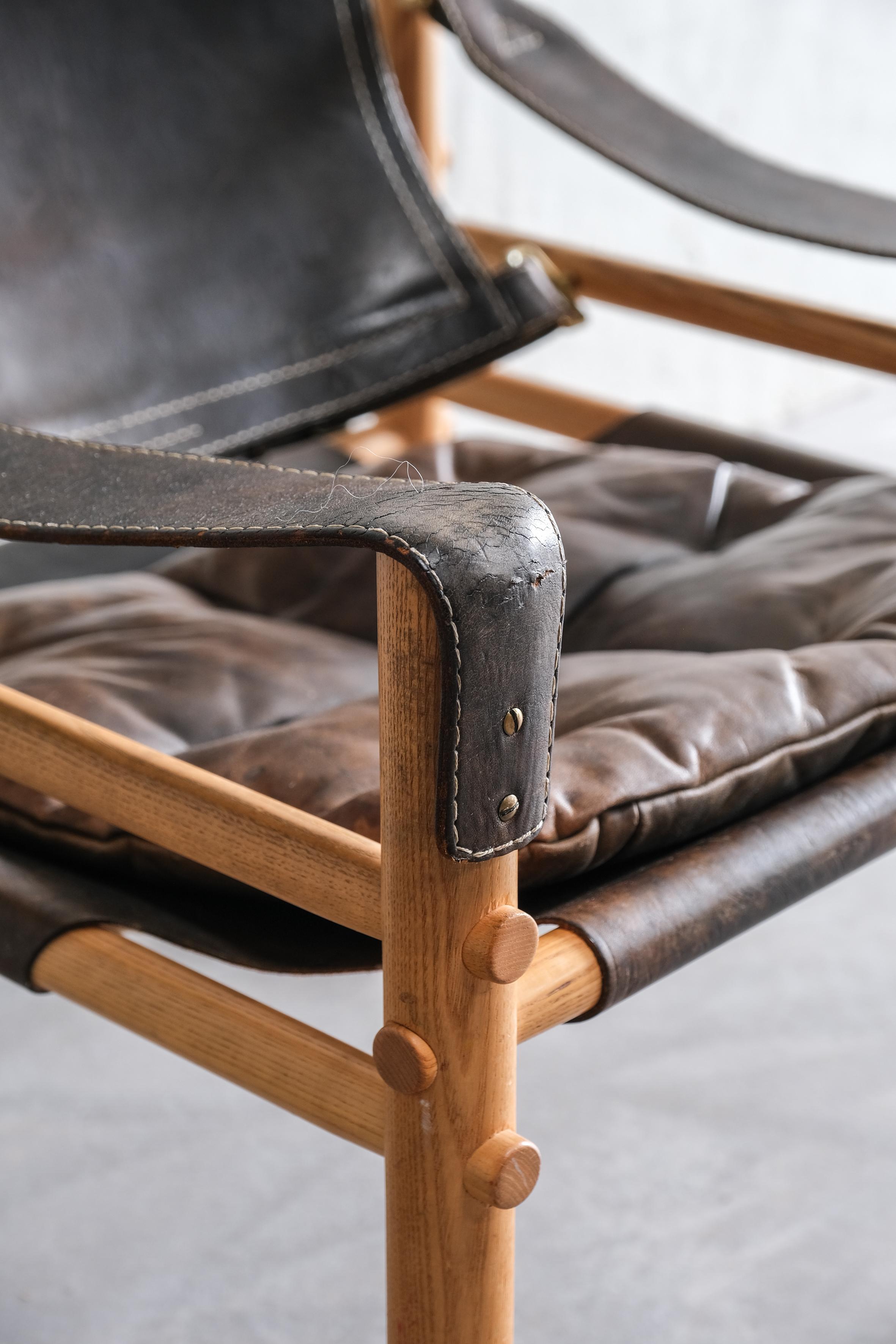 Sirocco Safari chair by Arne Norell in black leather, Sweden 1970 For Sale 9