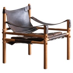 Sirocco Safari chair by Arne Norell in black leather, Sweden 1970