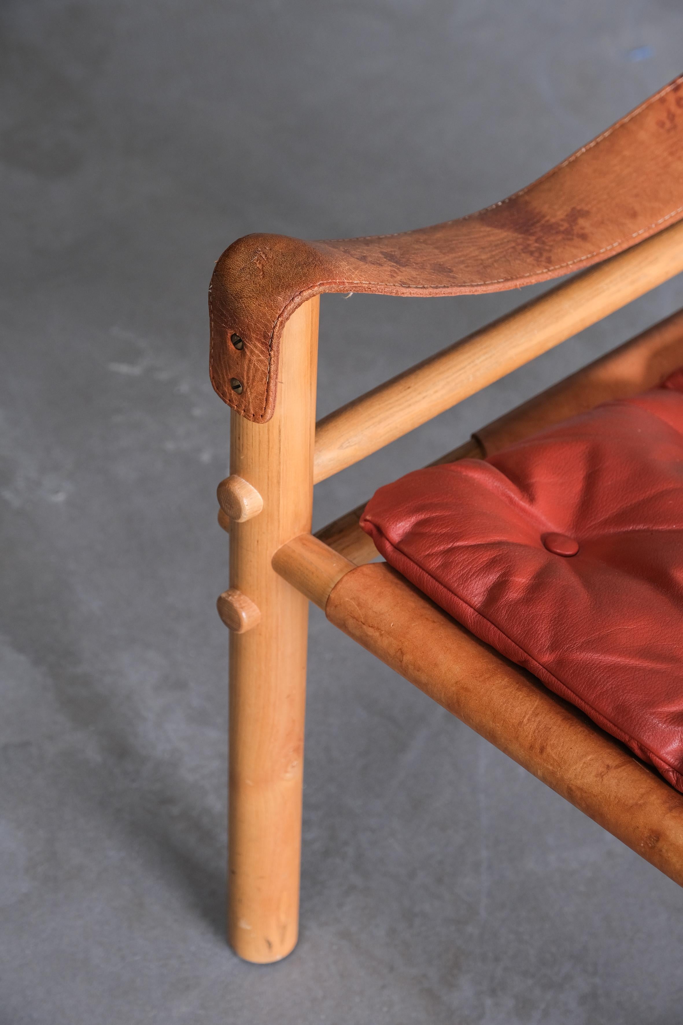 20th Century Sirocco Safari chair by Arne Norell in red leather, Sweden 1970
