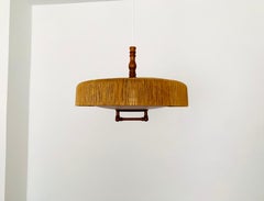 Sisal and teak pendant lamp from Temde