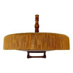 Sisal and teak pendant lamp from Temde