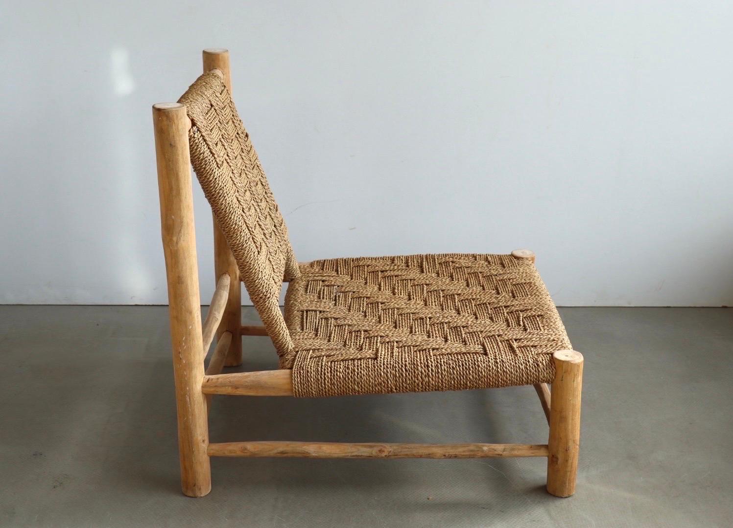 Very stylish ash wood frame low chair with thick and sturdy rope upholstery. Both frame and sisal is in excellent condition, no damages whatsoever. the frame is -very importantly- NOT lacquered or varnished; it is just plain dry and pale ash wood,