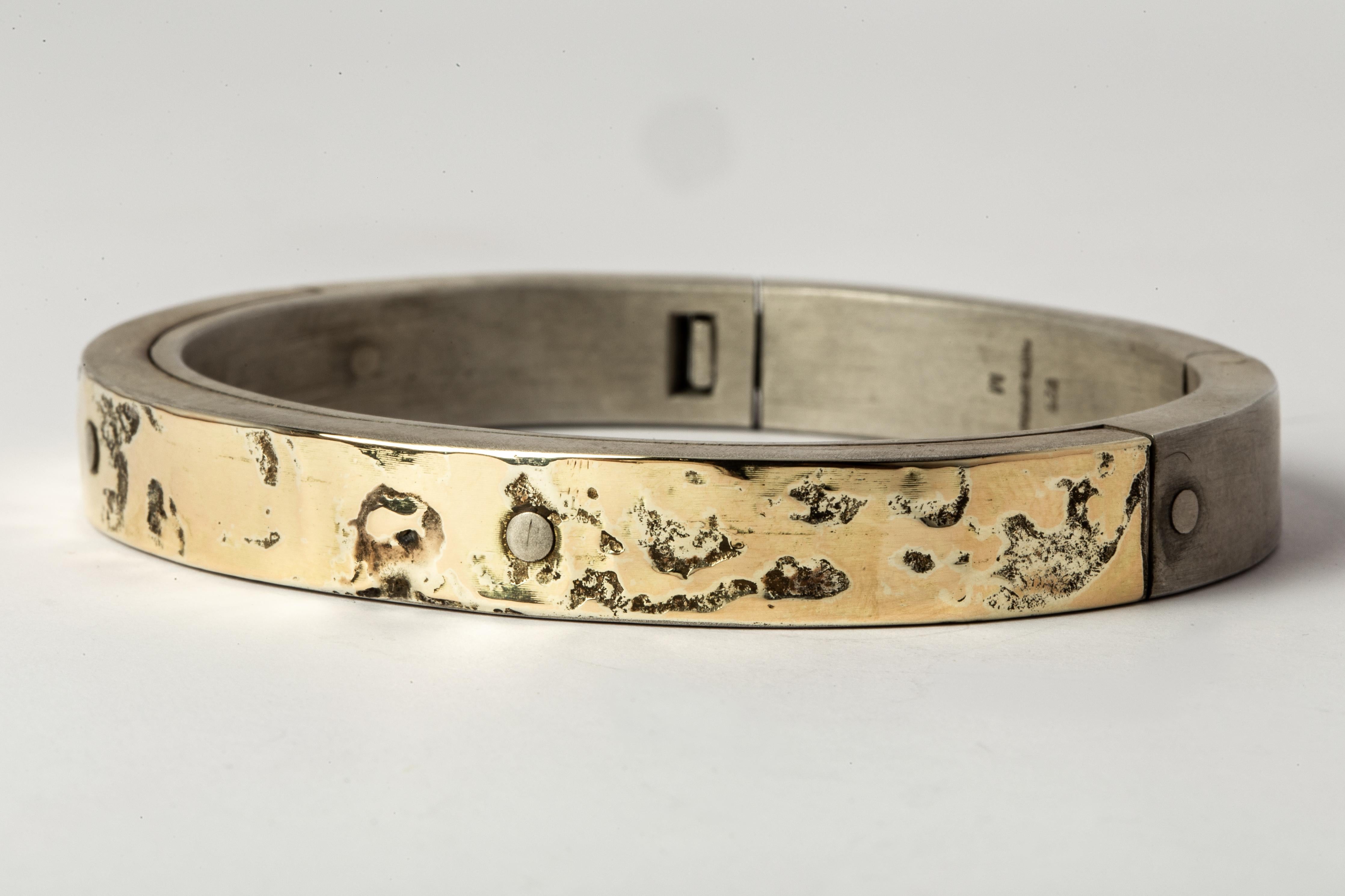 Sistema bracelet in sterling silver and 18k solid yellow gold layer fused on the surface. The 
