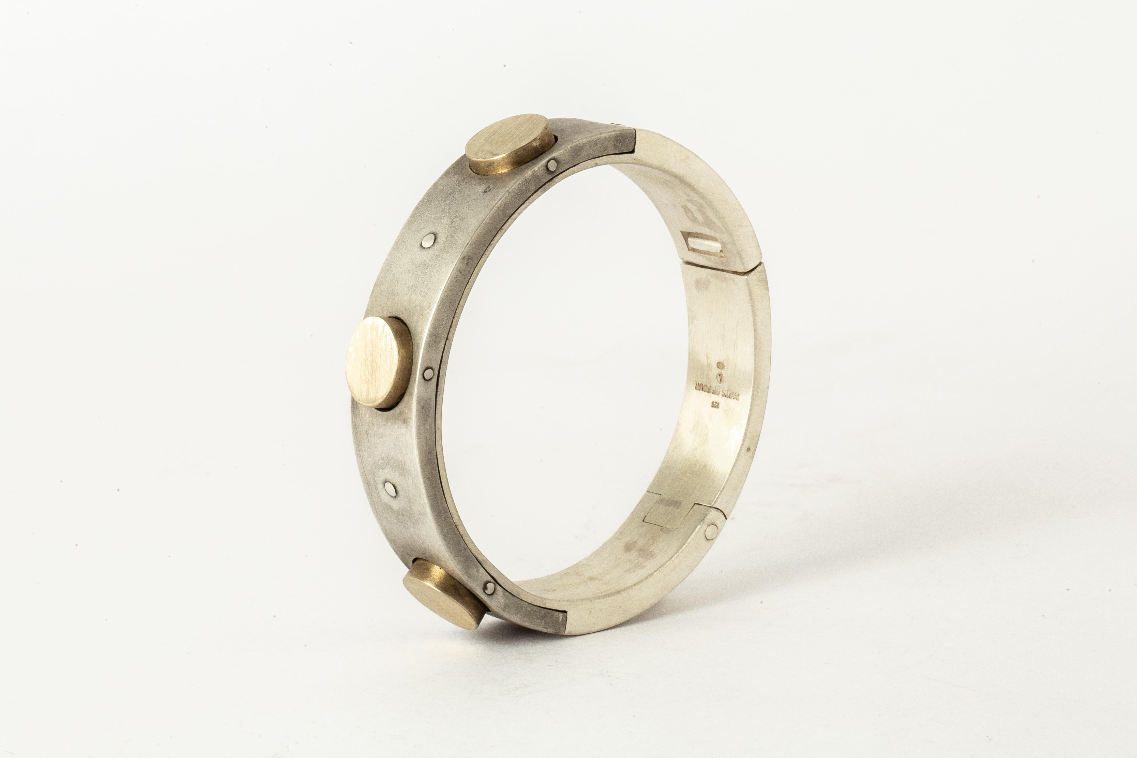 Bracelet in matte sterling silver, dirty sterling, and matte brass. The Sistema series is first family within Parts of Four. As a mode of creation it expresses the core principle of P/4 which is modularity. The 
