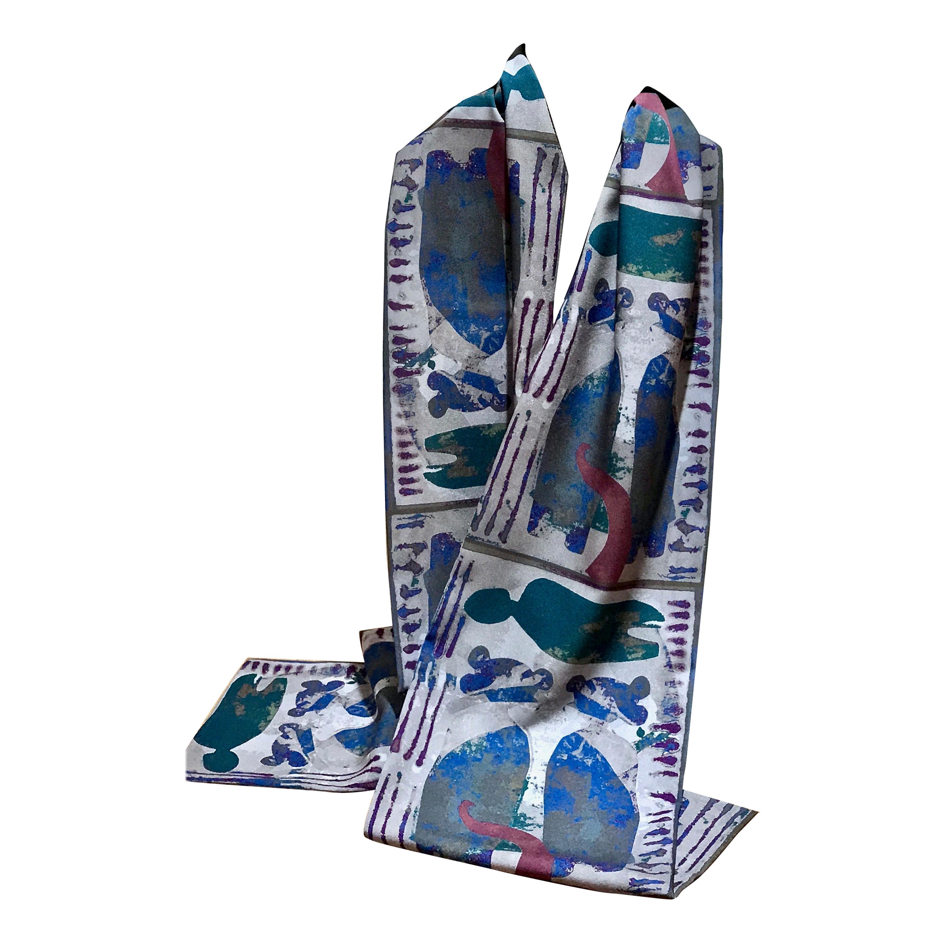 Sister Twins, scarf Melanie Yazzie Navajo purple-gray blue-green Hopi
Lightweight and easy care poly crepe de Chine fabric with digitally printed Melanie Yazzie designs in gray, blue, green, and magenta. Easy to wear and comfortable. Makes a great