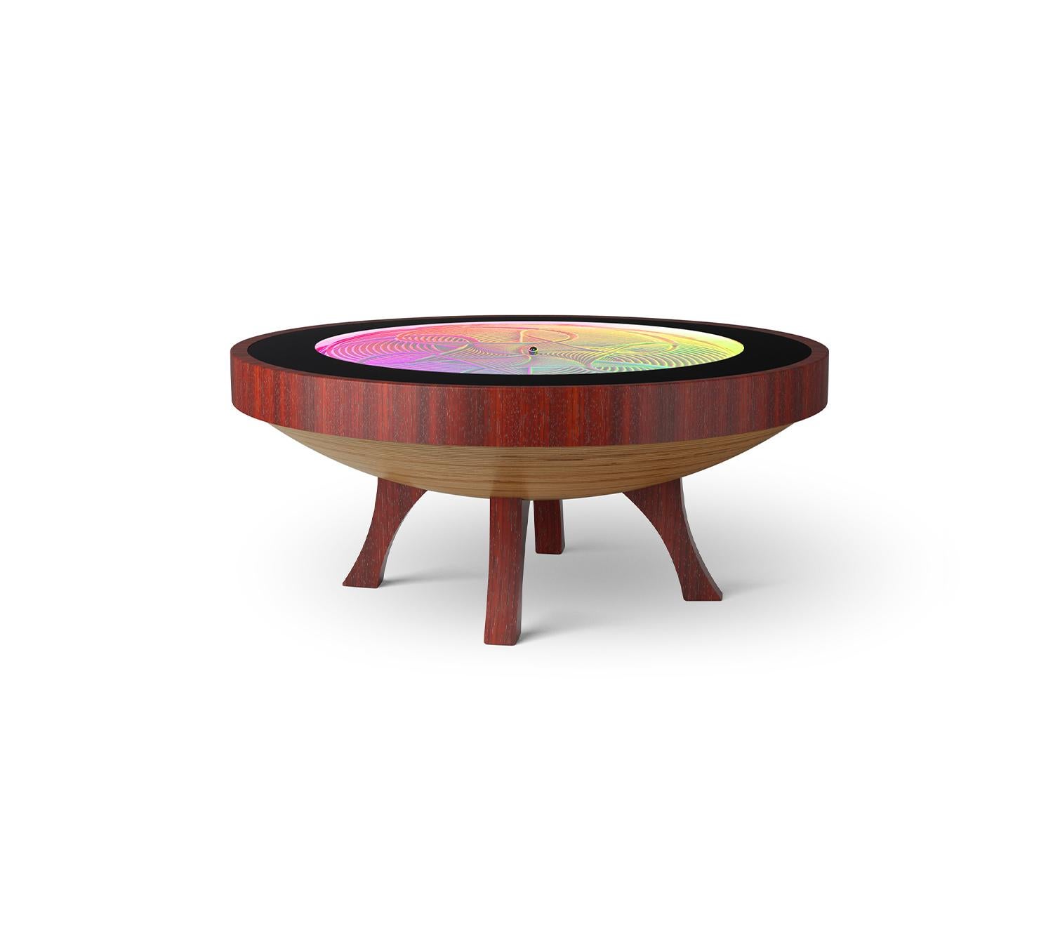 The Hardwood Coffee Table is kinetic art merged with luxury design. Assembled with premium quality hardwood, and specially selected veneer hand applied by a skilled artisan, the Hardwood Medium Coffee Table is a durable, beautiful showstopper. Each