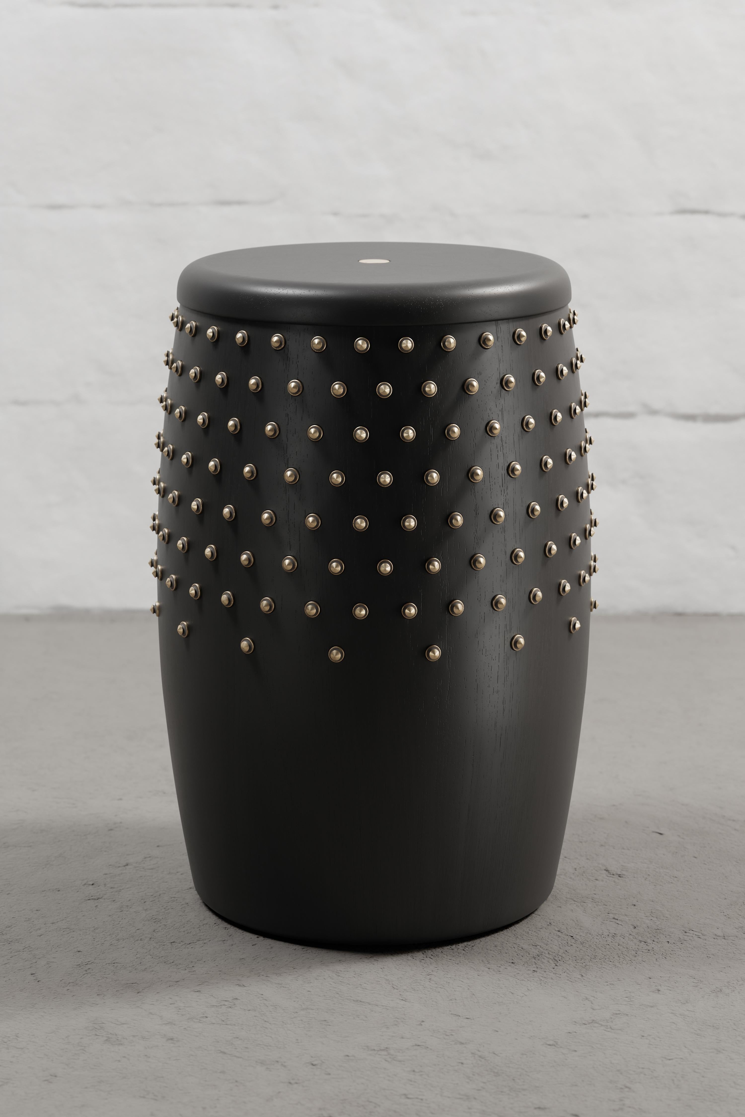 Stool crafted from solid Seike wood with Ébano finish, featuring thick leather accents, and aged bronze or stainless steel CNC-lathed hardware.

Our SITIERA_01 stool and side table embodies our commitment to conscious design, reflected not only in