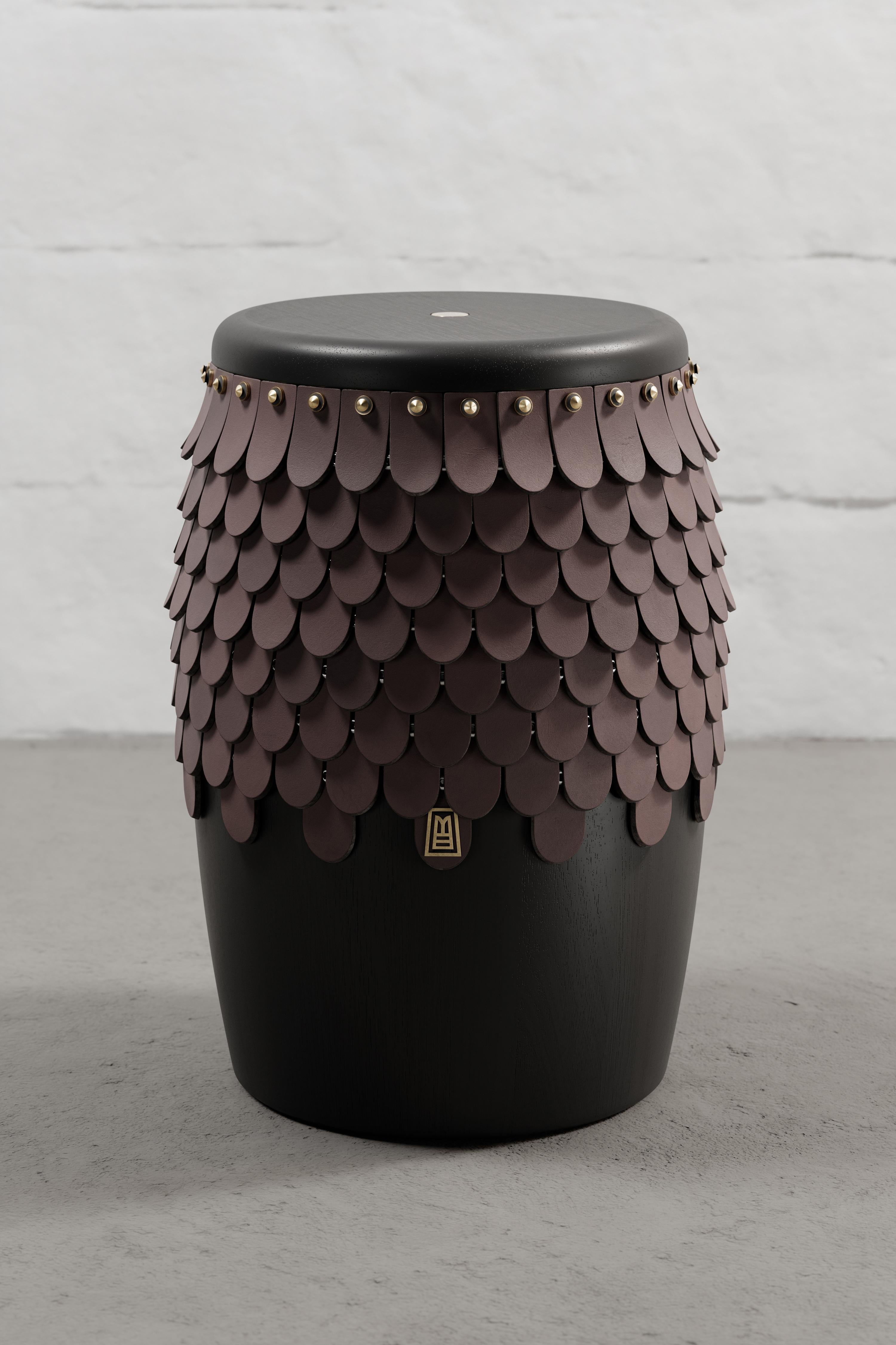 Stool crafted from solid Seike wood with Ébano finish, featuring thick leather accents, and aged bronze or stainless steel CNC-lathed hardware.

Our SITIERA_01 stool and side table embodies our commitment to conscious design, reflected not only in