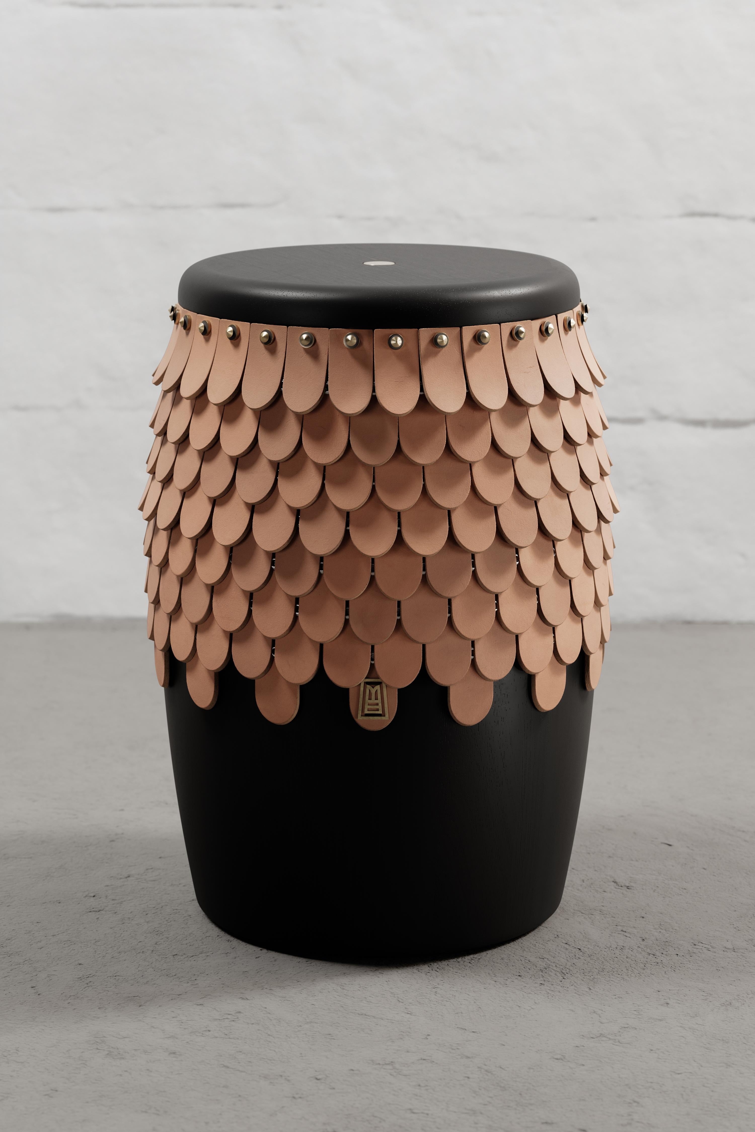 Stool crafted from solid Seike wood with Ébano finish, featuring thick leather accents, and aged bronze or stainless steel CNC-lathed hardware.

Our SITIERA_01 stool and side table embodies our commitment to conscious design, reflected not only in