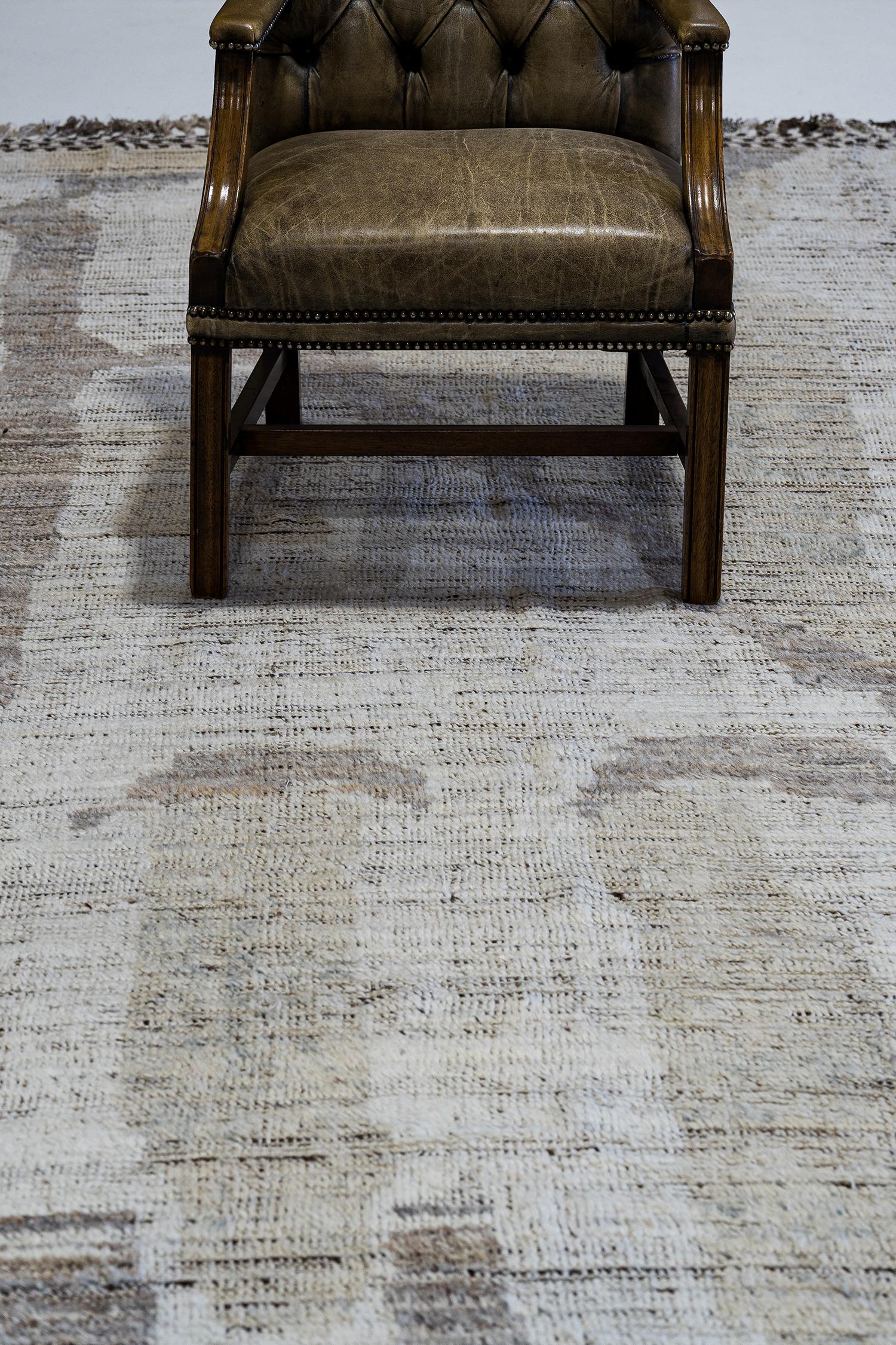 Sittima' is a natural earth toned pile weave and modern day interpretation of the Moroccan world. The rugs irregular shapes and strokes resemble the fibers of nature and their ability to be used for crafts such as cords and basketry. Designed in Los