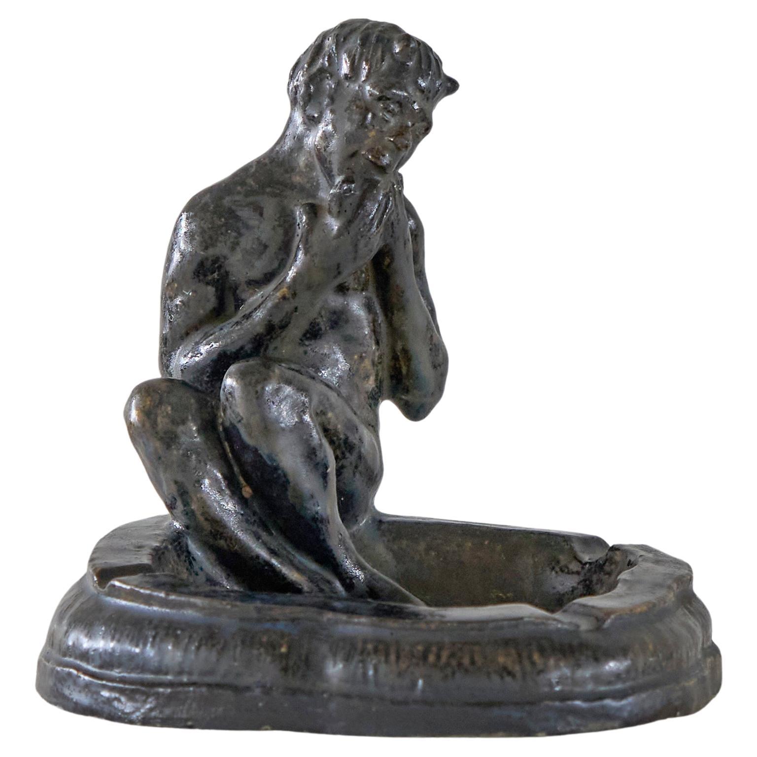 Faune assis Sculpture en émail lustré Début du 20e siècle