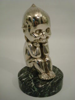 Sitting Kewpie or The Thinker, Silvered Bronze Car Mascot Hood Ornament, 1910´s