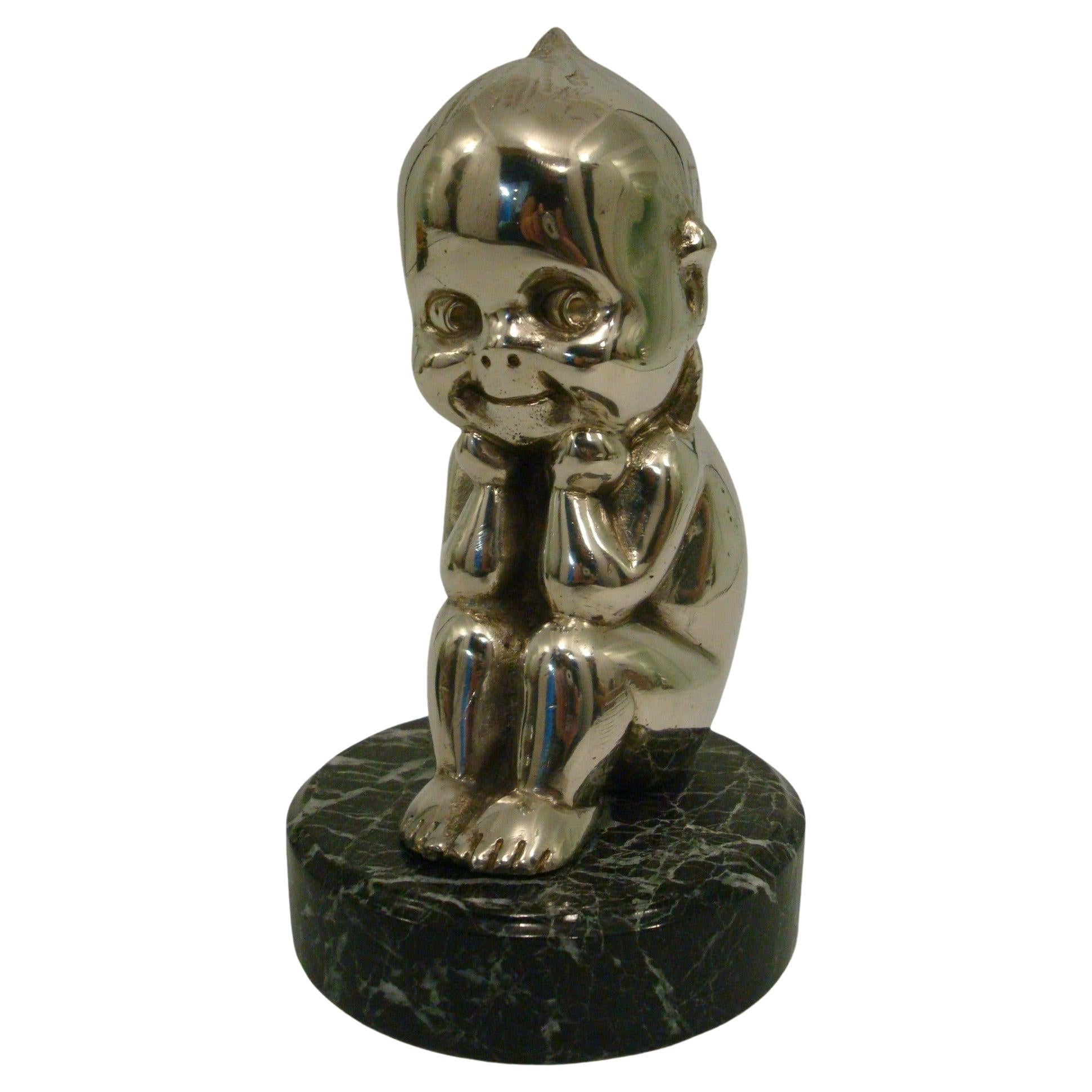 Sitting Kewpie or The Thinker, Silvered Bronze Car Mascot Hood Ornament, 1910´s