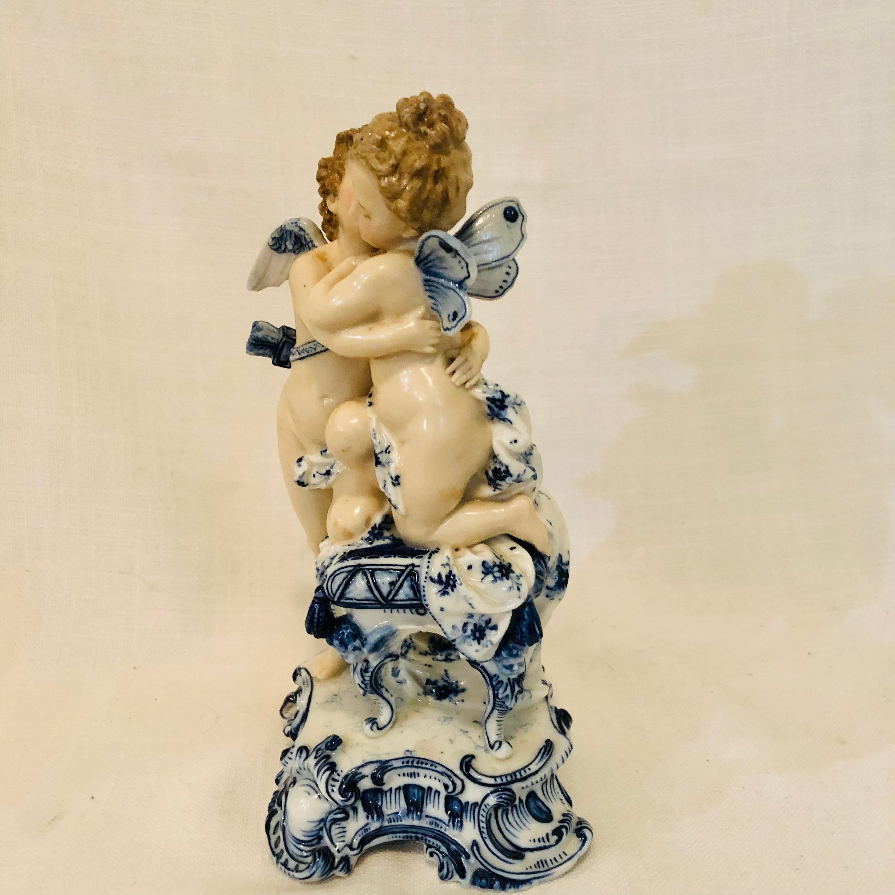 Romantic Sitzendorf Dresden Figurine with Kissing Angels with Blue and White Decoration