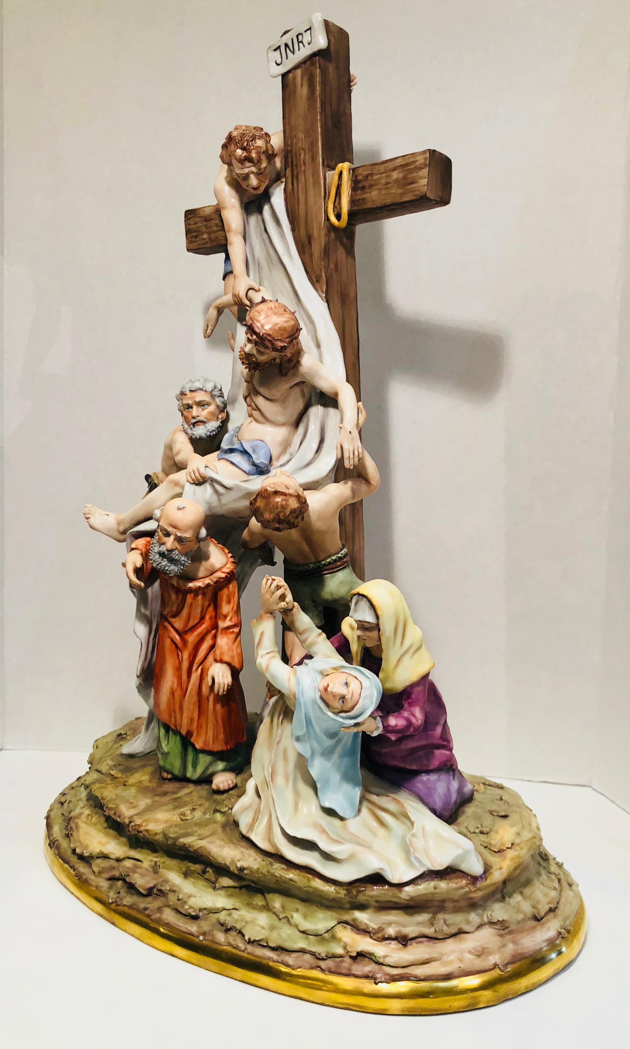 Very large, handmade and hand painted, museum quality porcelain from Sitzendorf Porcelain Manufactory in Thuringia, Germany depicts one of the most famous religious scenes in all of Christianity, the Thirteenth Station of the Cross. In this scene,