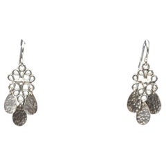 Silver one motif earrings