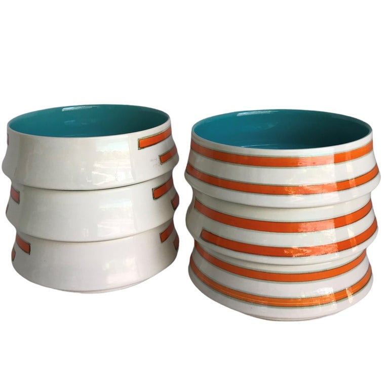Offered here are six hefty in size bowls perfect for pasta or salad or a great soup. With their aqua blue interior… stunning and an outside of cream color accented with orange horizontal stripes, they are a paradise of color. So modern and