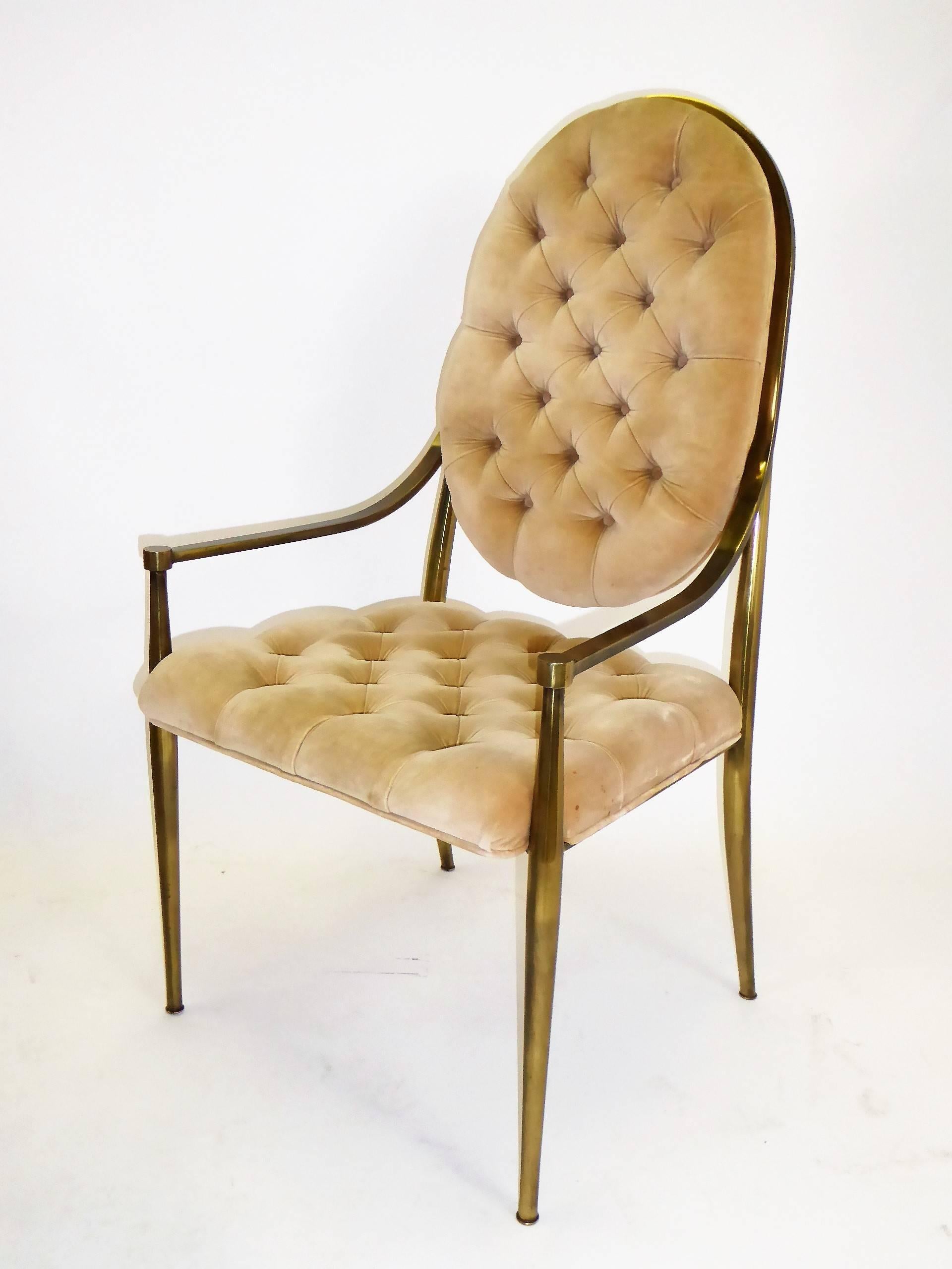 REDUCED FROM $4,800....Six Mastercraft dining chairs with antiqued brass frames and tufted velvet upholstery. Firmly Mid-Century Modern, they are best described as Hollywood Regency with their glamour and nod to the traditional and classical. In