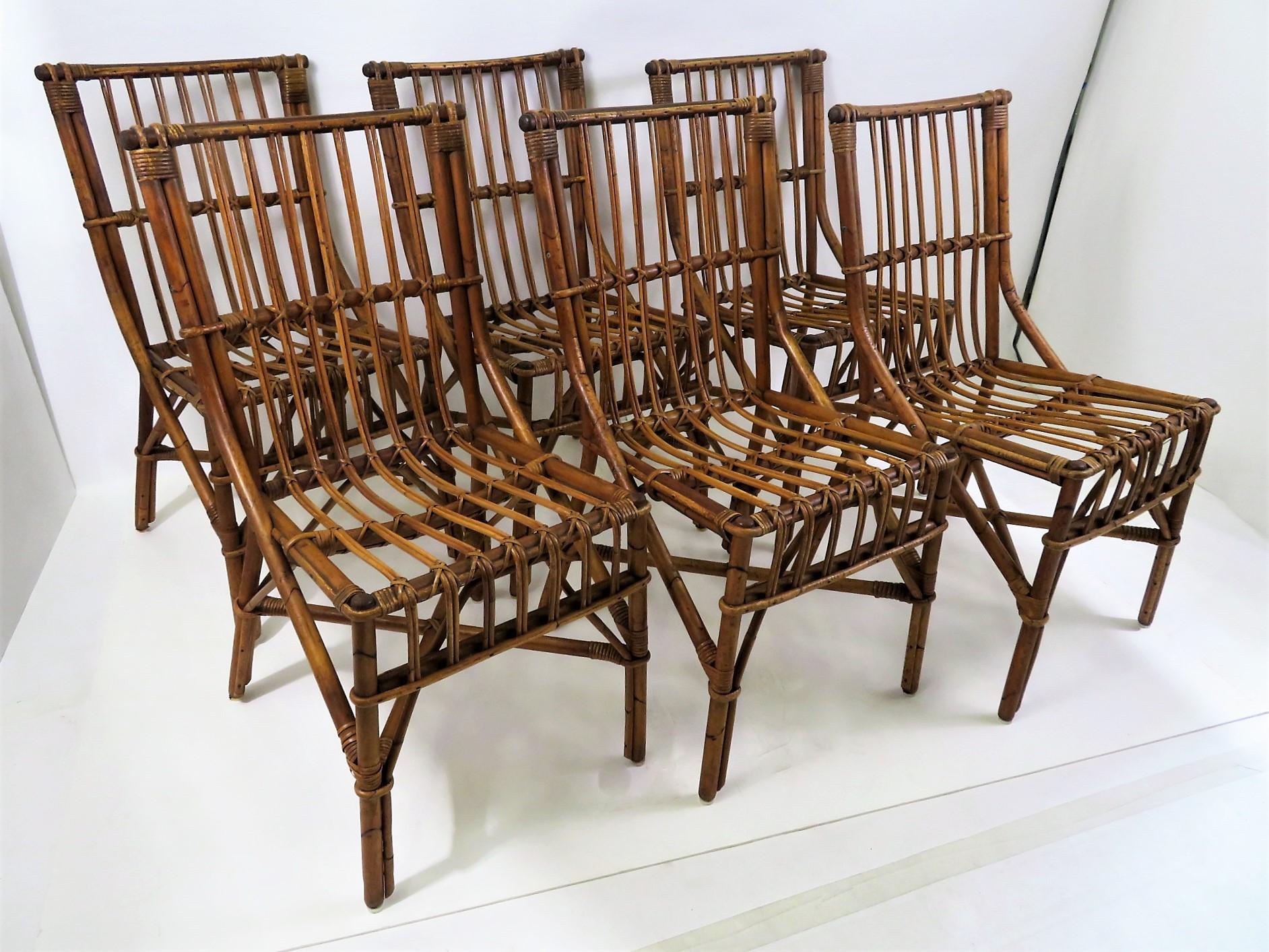 6 Extremely well realized faux Bamboo and Twig (real) dining chairs with exceptional style from the Italian firm Dal Vera. Rustic, with mottled color, they are in fine condition with no losses to any binding. Unmarked as to maker, they are