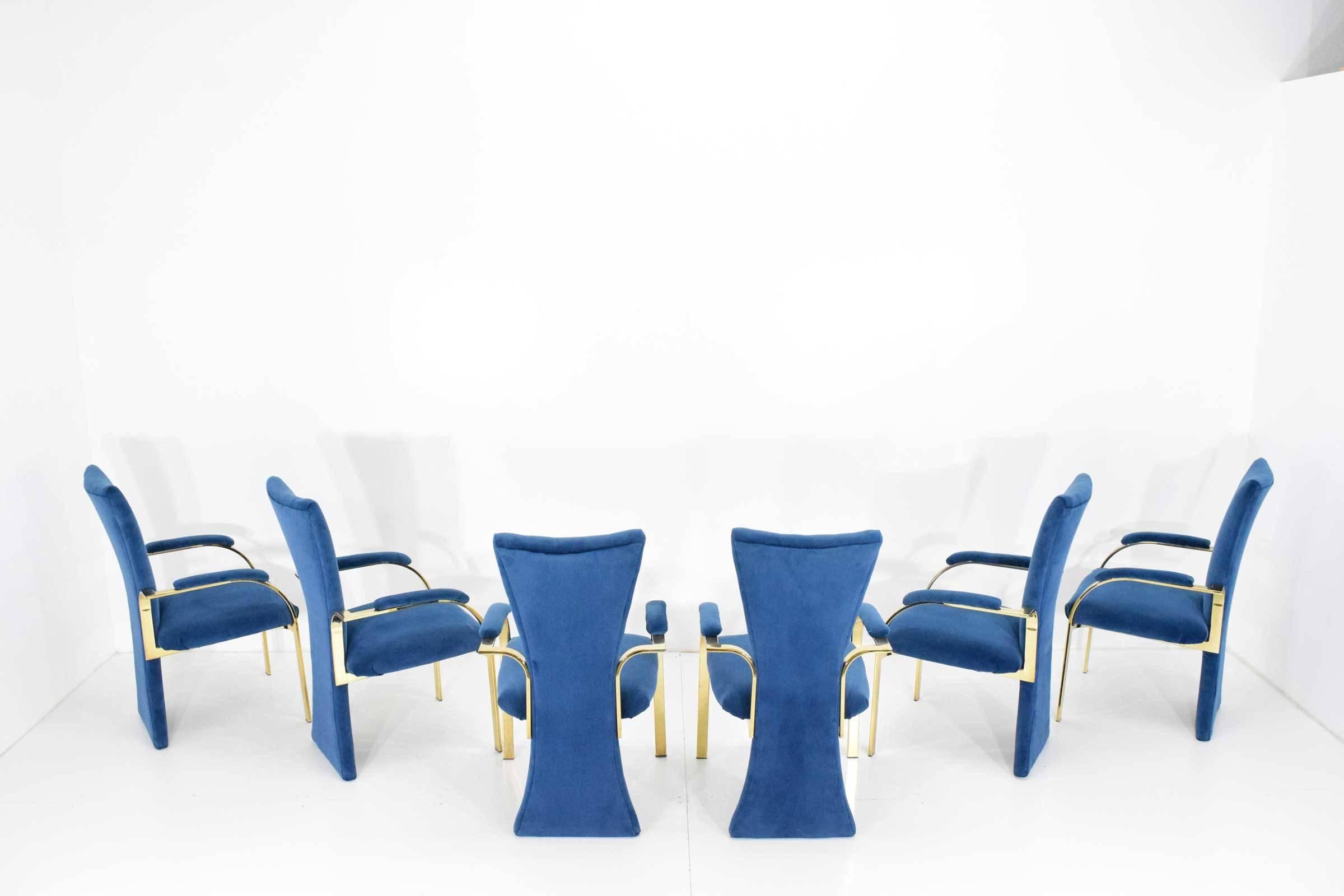 These high-style chairs make a statement. Beautiful velvety blue fabric with brass finish frames. Milo Baughman style. Distributed by Carson's of High Point. These can be reupholstered if desired.