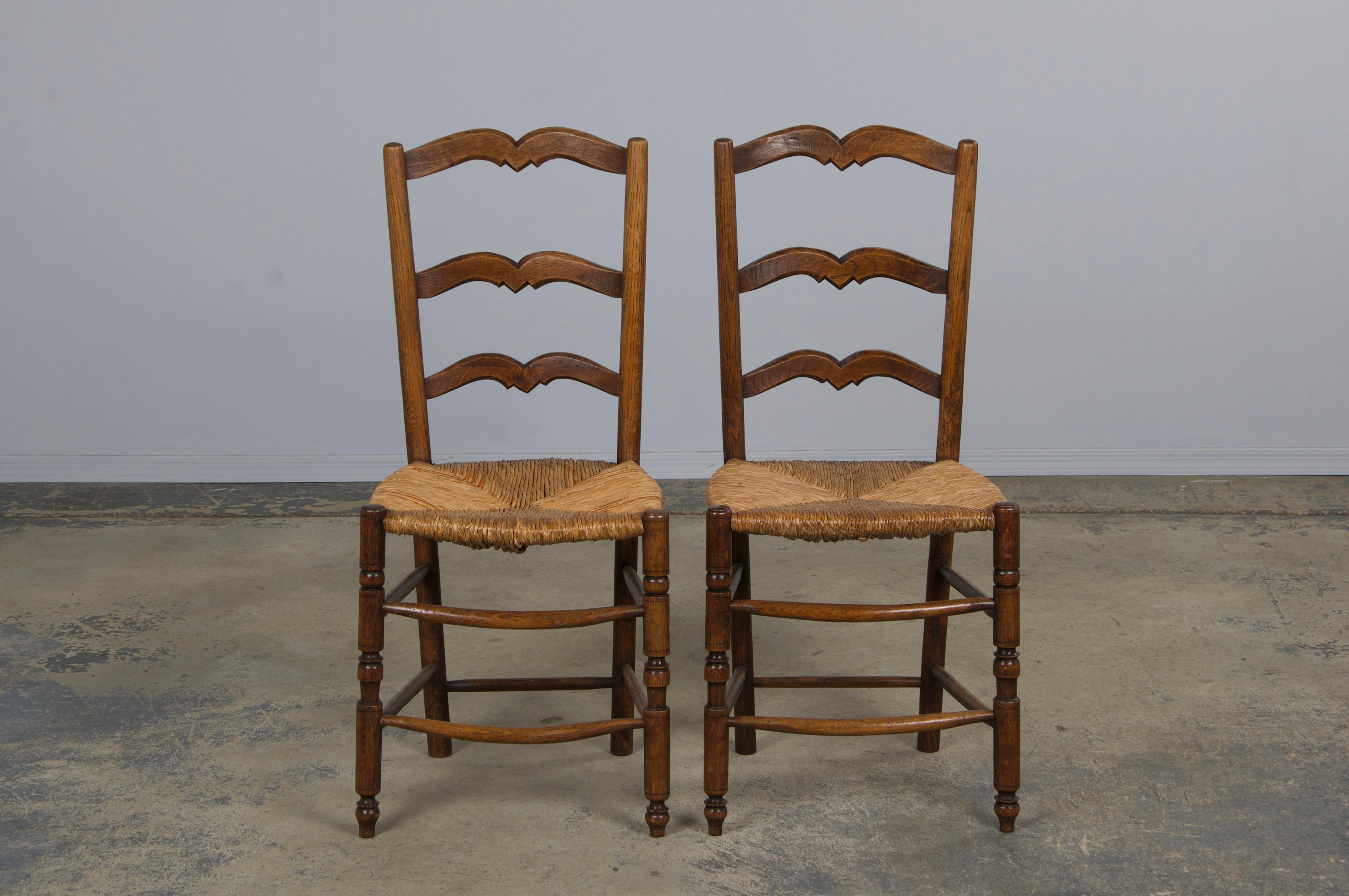 Six 19th Century French Provincial Ladder Back Oak Dining Chairs W/ Rush Seats For Sale 1