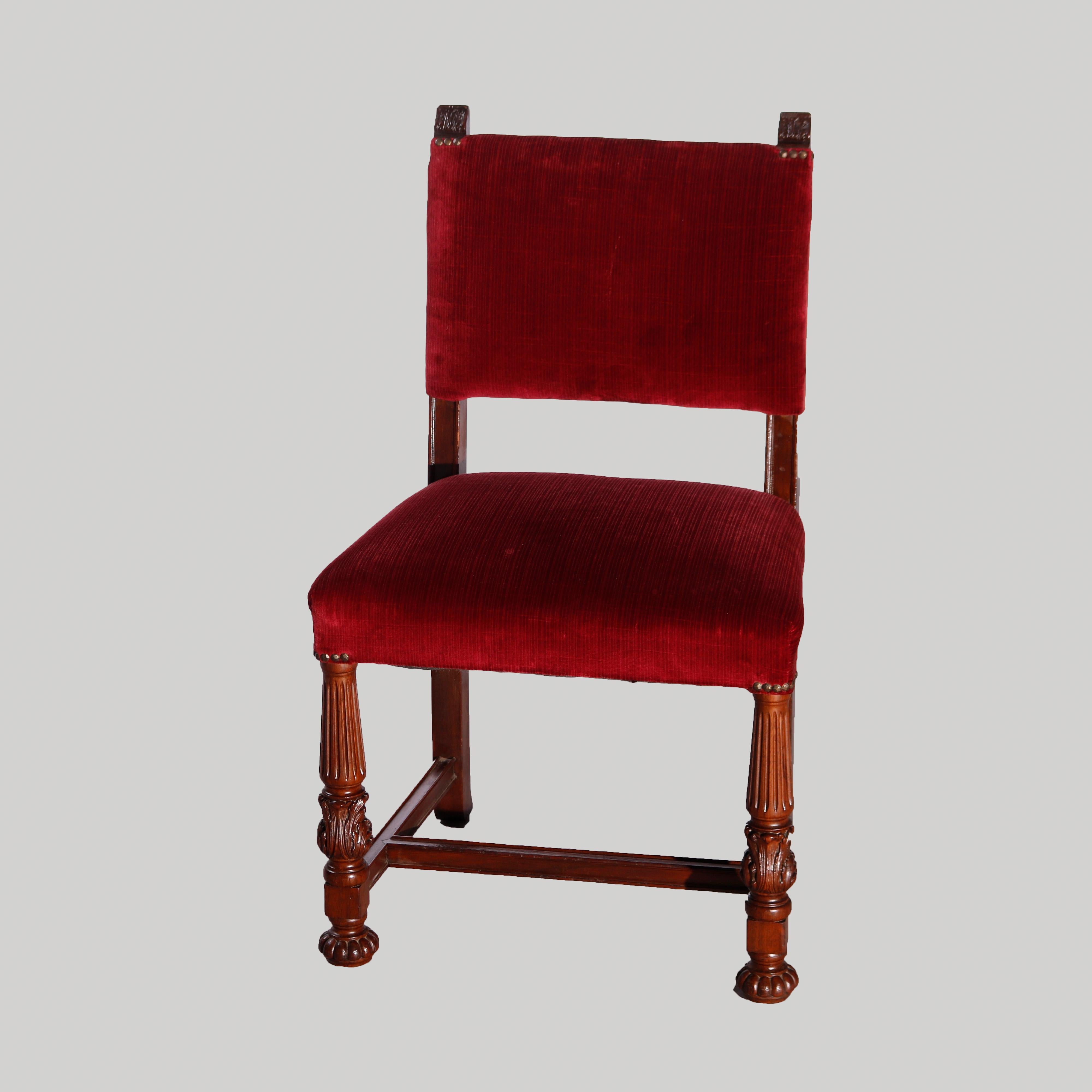 An antique set of six Classical French Renaissance dining chairs offer complementing upholstered backs and seats on mahogany frames with carved reeded and foliate elements, set includes one armchair and five sides, c1900

Measures- 37.5''H x