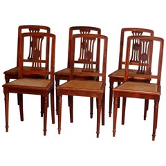 Six chaises anciennes françaises Louis XVI en acajou avec assise en rotin, début du 20ème siècle