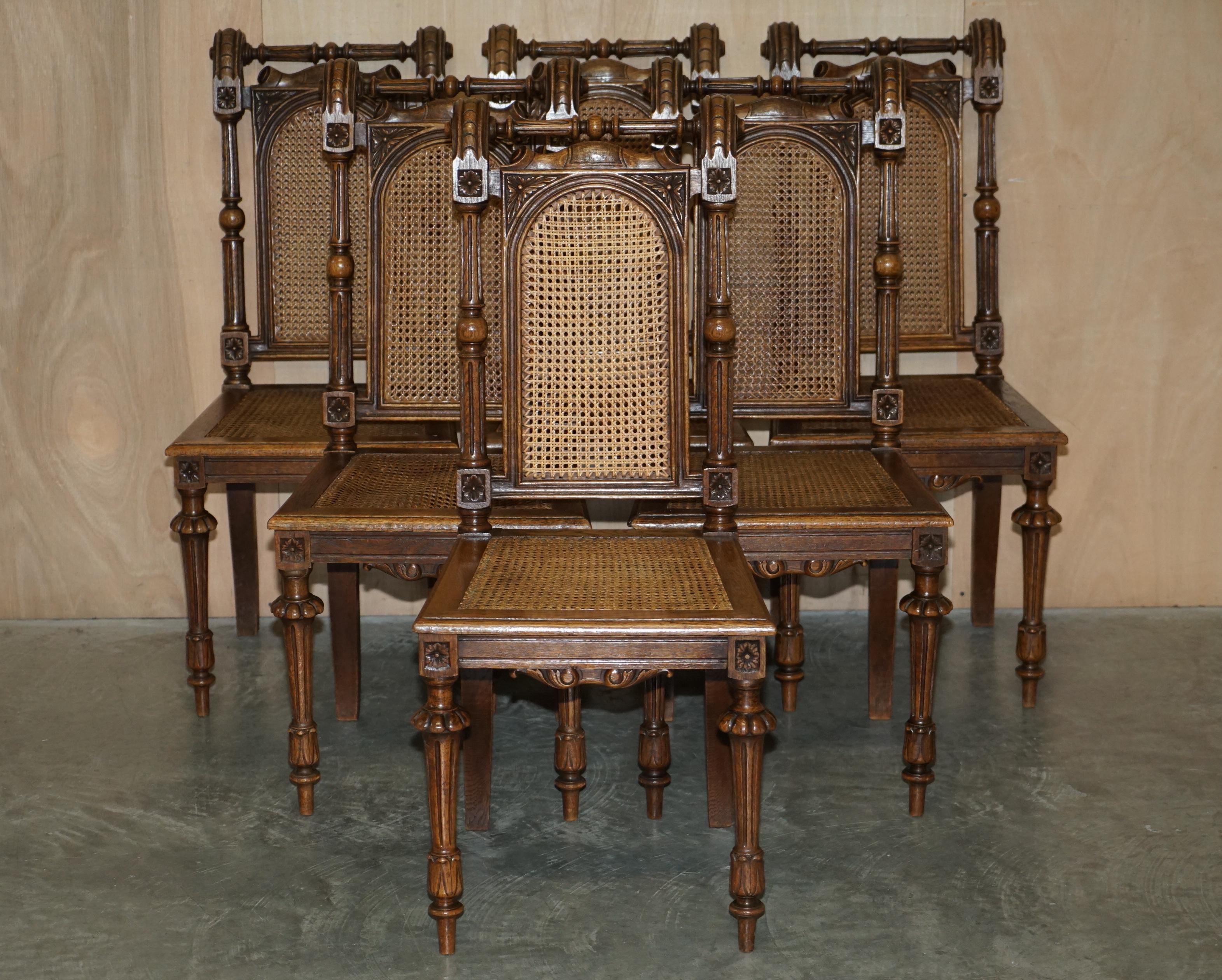 We are delighted to offer for sale this lovely suite of six Jacobean Revival hand carved walnut dining chairs with Bergere seats and backs.

A very good looking and well made suite, circa 1840-1860 but based on a much earlier design, the frames
