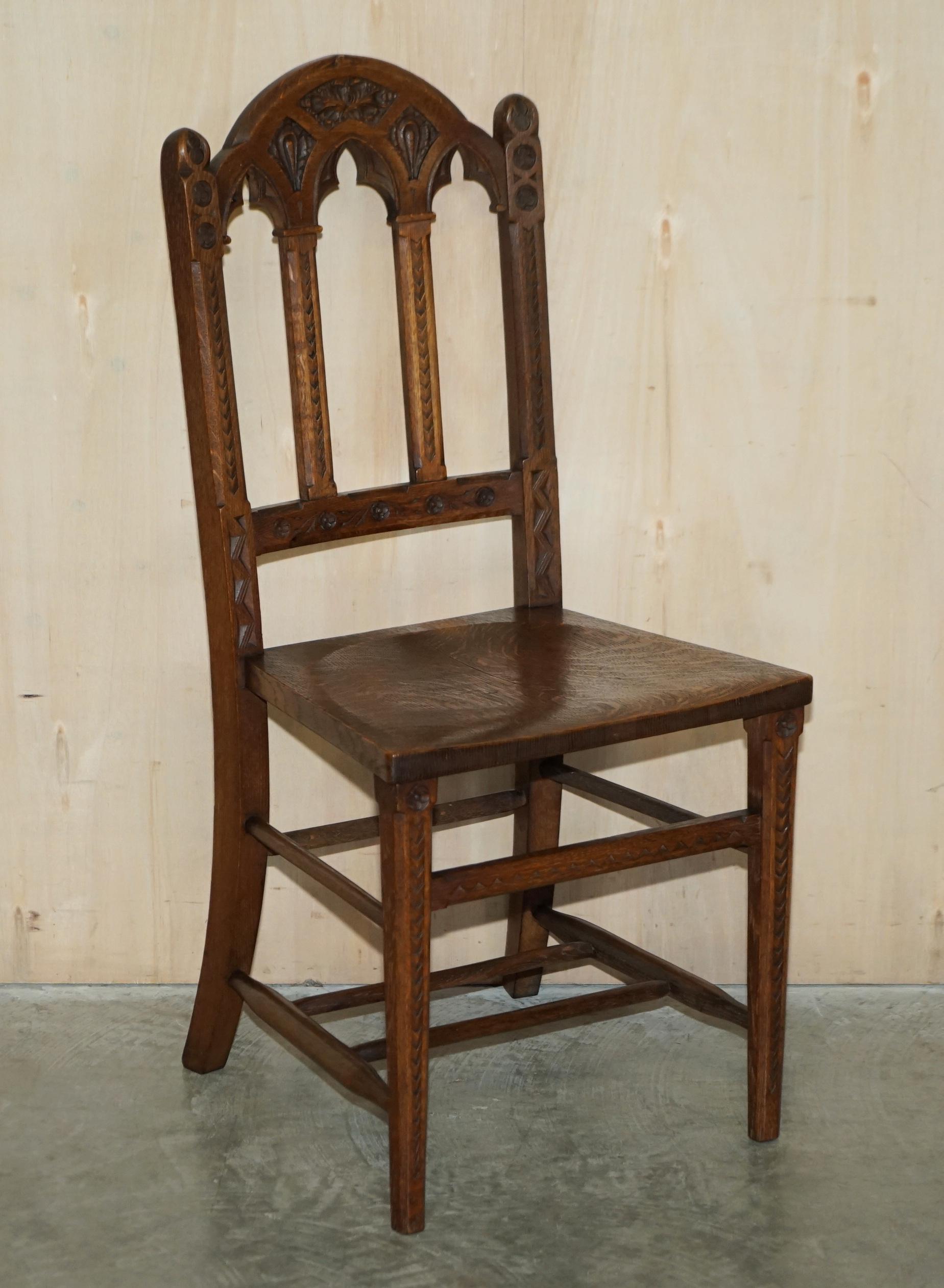 Gothic Revival SIX ANTIQUE ORNATELY CARVED STEEPLE BACK WALNUT GOTHIC REVIVAL DiNING CHAIRS For Sale