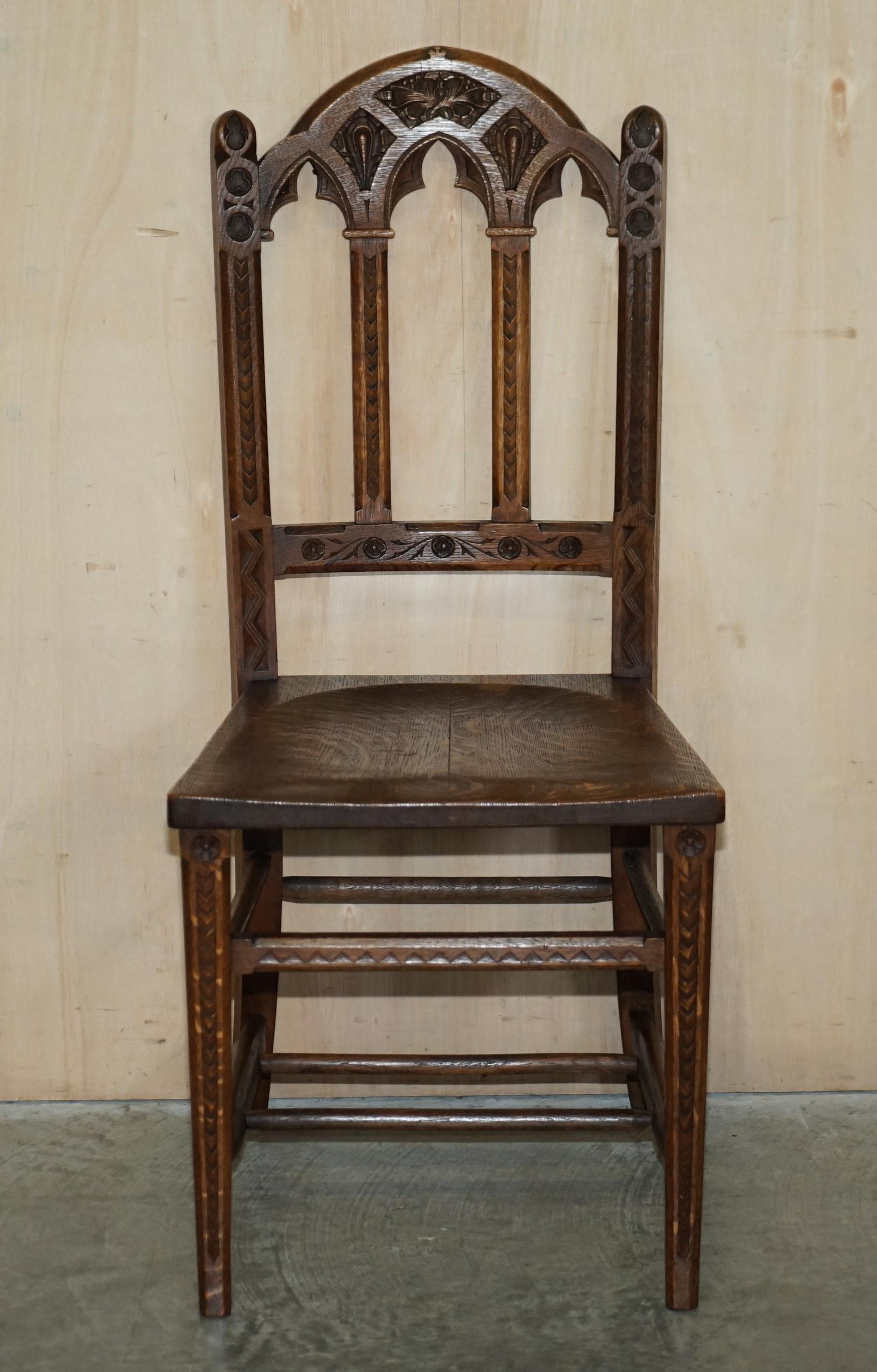 European SIX ANTIQUE ORNATELY CARVED STEEPLE BACK WALNUT GOTHIC REVIVAL DiNING CHAIRS For Sale