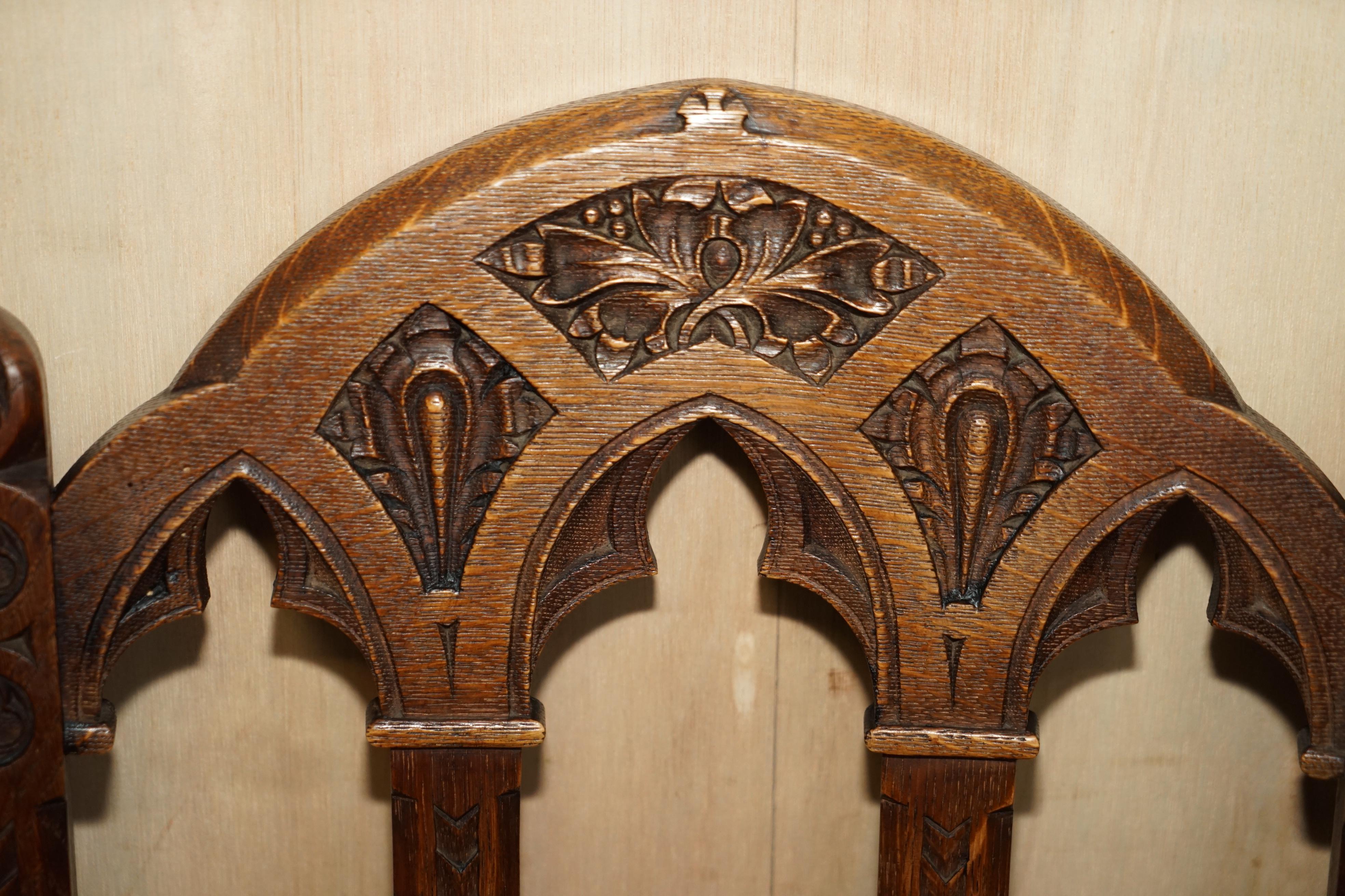 SIX ANTIQUE ORNATELY CARVED STEEPLE BACK WALNUT GOTHIC REVIVAL DiNING CHAIRS For Sale 2