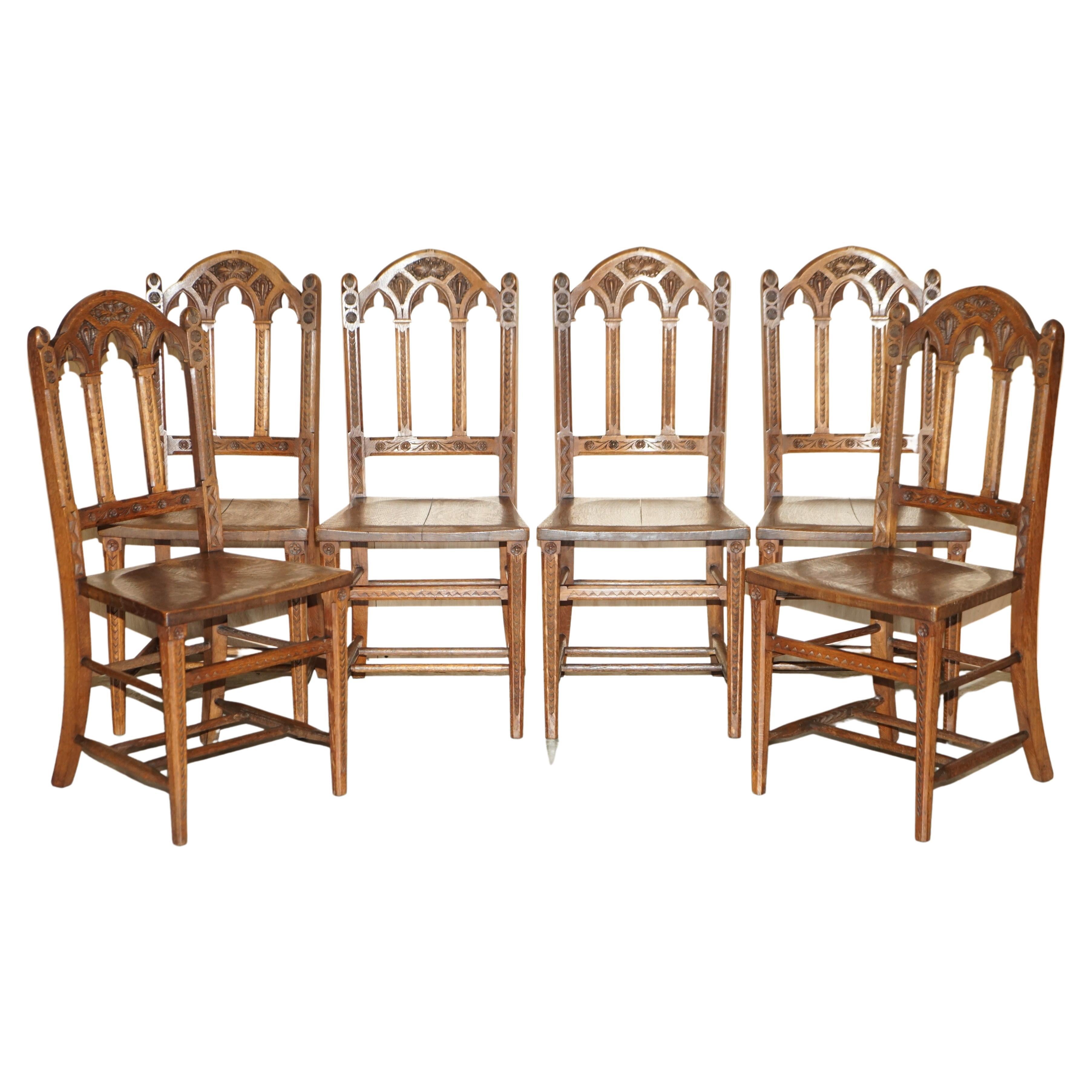 SIX ANTIQUE ORNATELY CARVED STEEPLE BACK WALNUT GOTHIC REVIVAL DiNING CHAIRS
