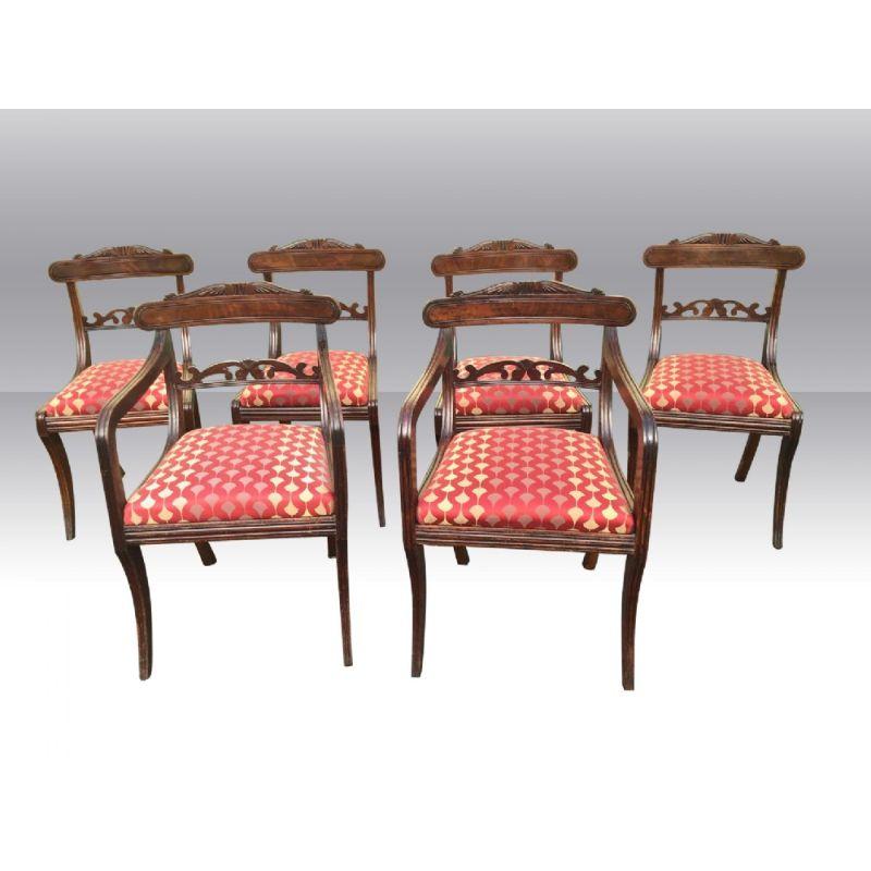Set of Six Antique Regency Period Mahogany Dining Chairs. (Four Plus Two Carvers) 

Circa 1820. 
Carvers 21ins wide x 21ins deep x 33.5ins high. 
Chairs. 18ins wide x 19 ins deep x 33.5ins high. 
Drop in seats. 
All strong of joint. 
