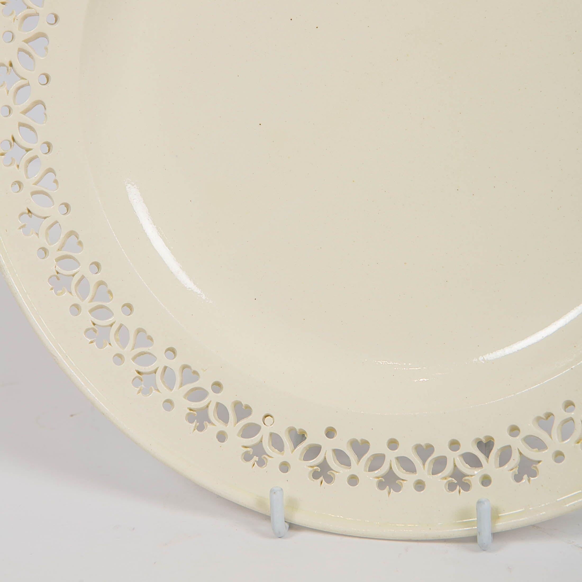 Why we love it:
18th century pierced creamware is simply elegant and beautiful.
We are proud to present this fantastic set of six antique pierced creamware dinner plates made in England, circa 1790. These late 18th century plates have heart and