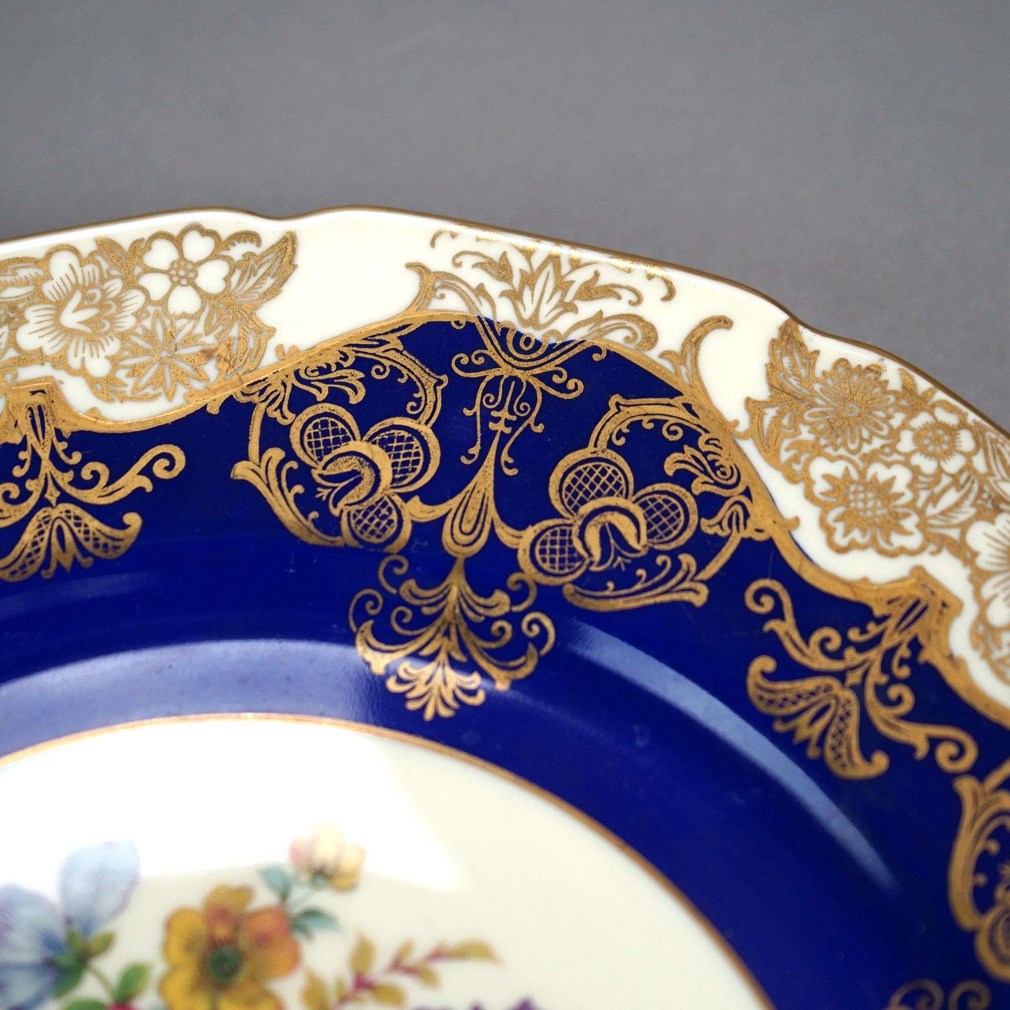 Six Antique English Rosenthal Hand Painted Floral & Gilt Ivory Porcelain Plates C1920

Measures - 10.5