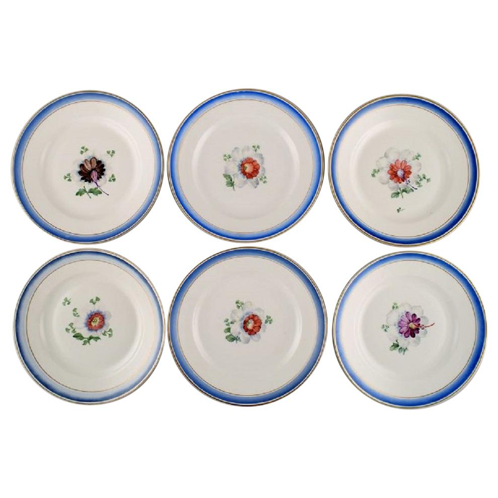 Six Antique Royal Copenhagen Plates in Hand Painted Porcelain with Flowers