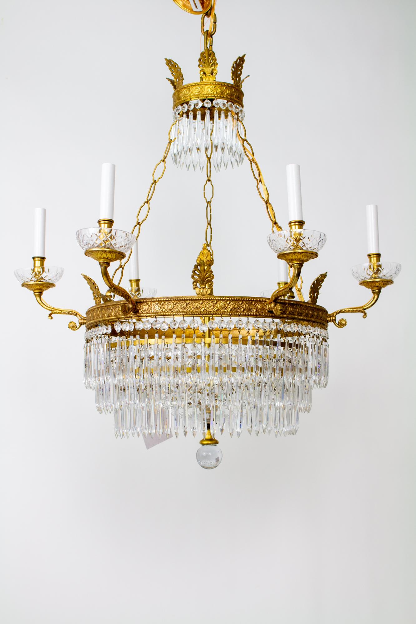 Gilt Six Arm Brass and Crystal Empire style Chandelier For Sale