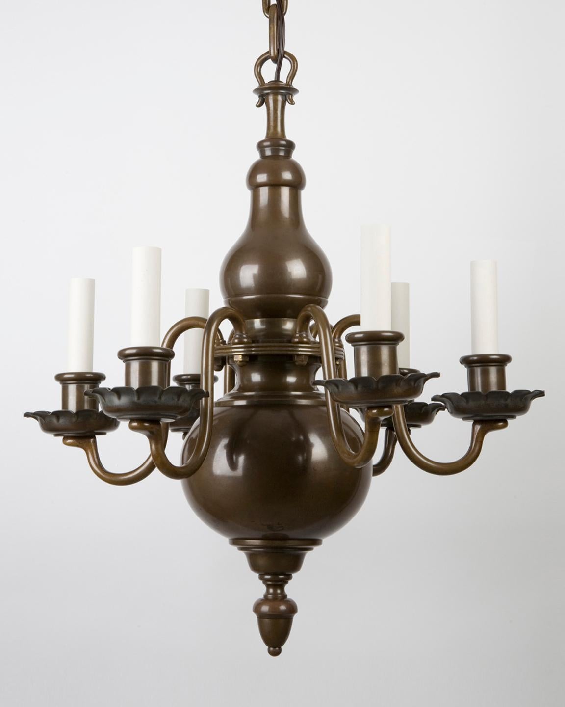 AHL3068

A six-light Flemish style chandelier with a full-figured baluster-form body and crimped-edged waxpans under the candle cups. In its beautiful original dark bronze patina. By the New York maker Edward F. Caldwell.

Dimensions:
Current