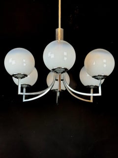 Six arms chandelier in murano glass spheres and chrome. Italy 1960s